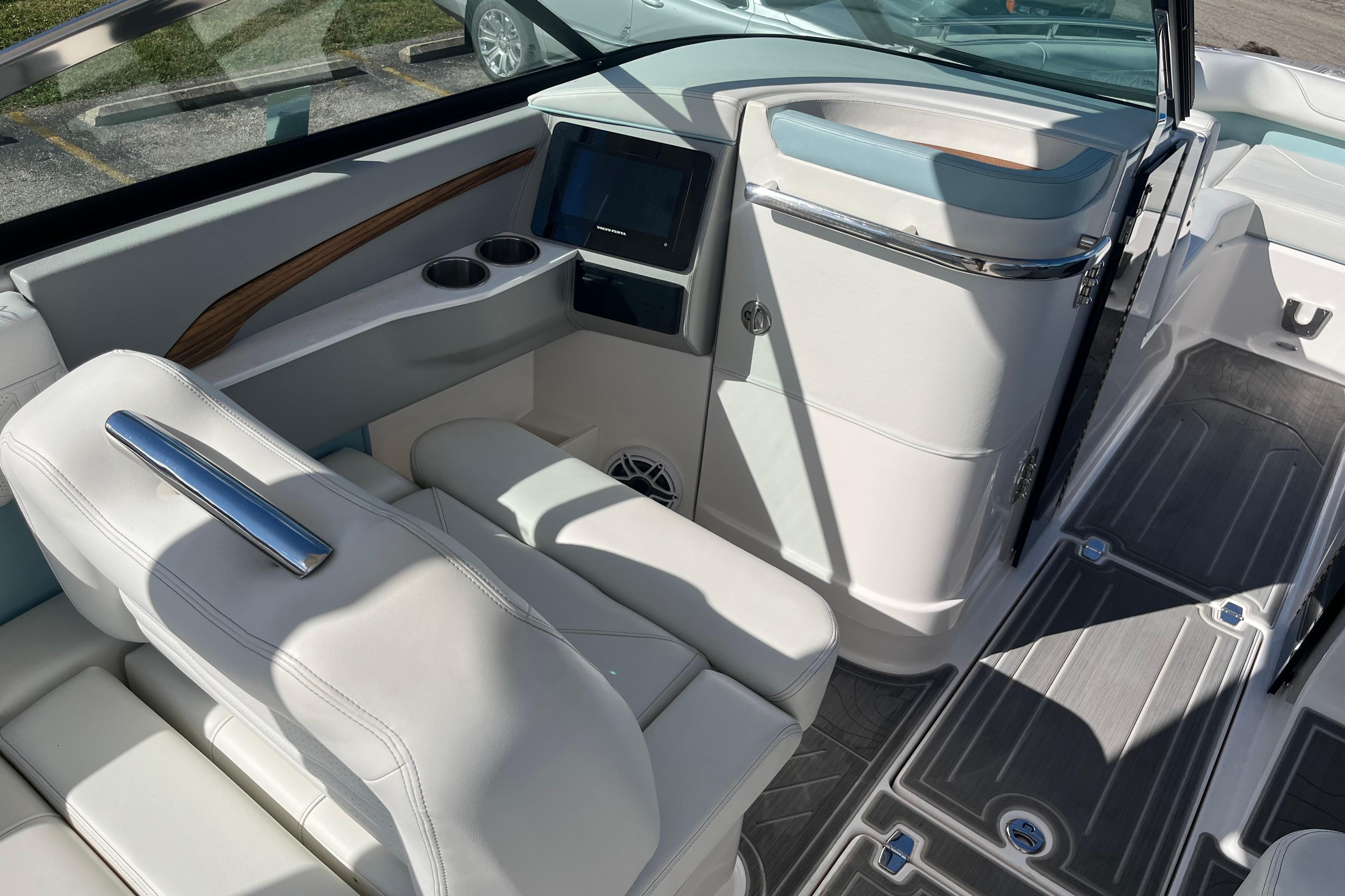 2024 Regal LS9 Surf boat interior with luxurious seating and modern dashboard design.