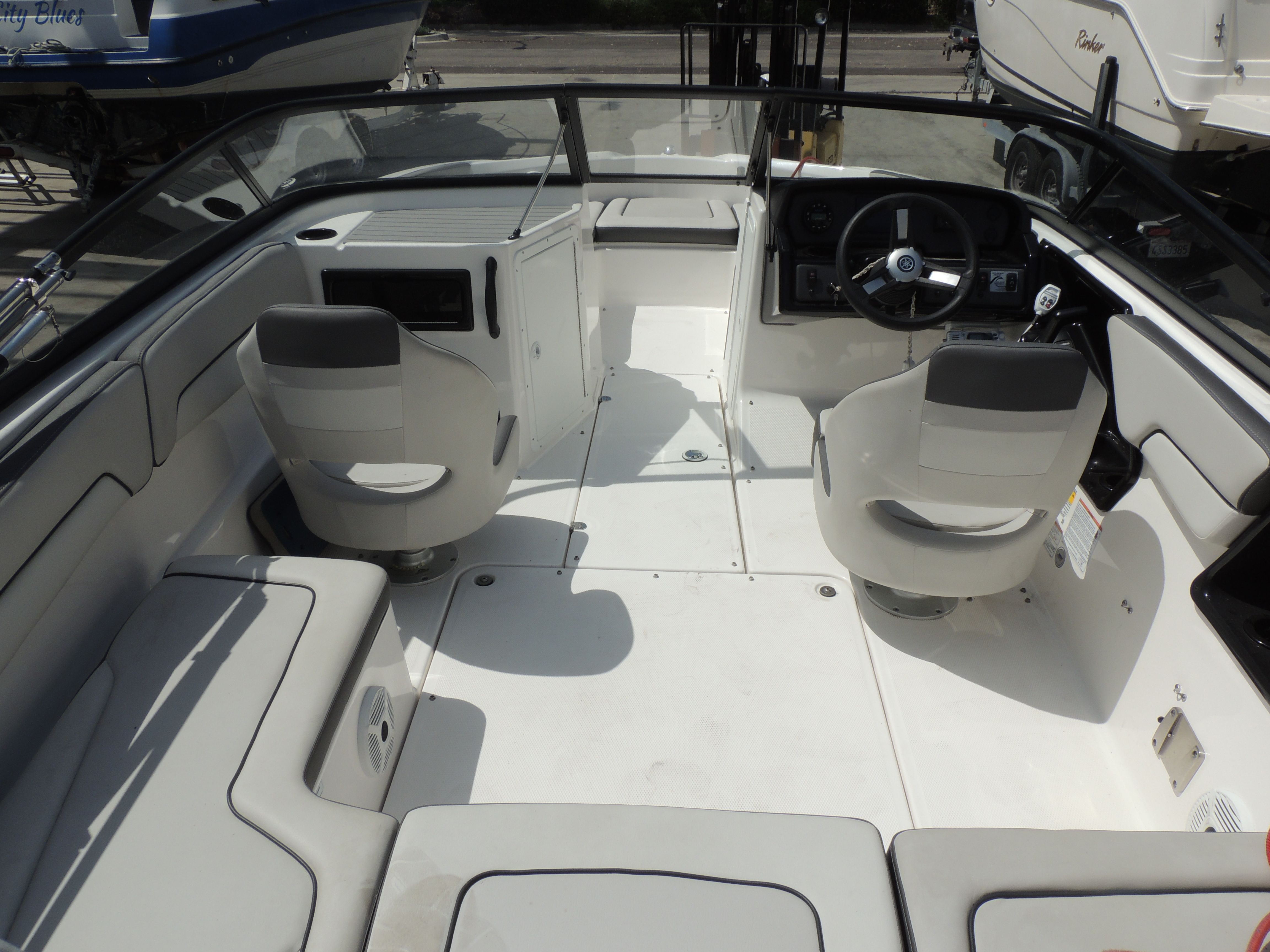Interior of a 2023 Yamaha SX190 boat with steering console.
