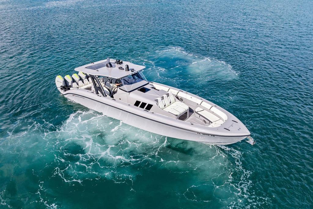 2022 Midnight Express 43' Solstice boat cruising on clear blue ocean waters.