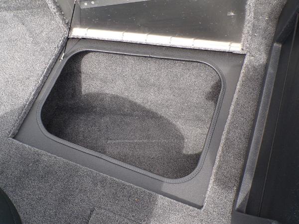 2025 Tracker Pro Guide™ V-175 Combo storage compartment with carpeted interior.