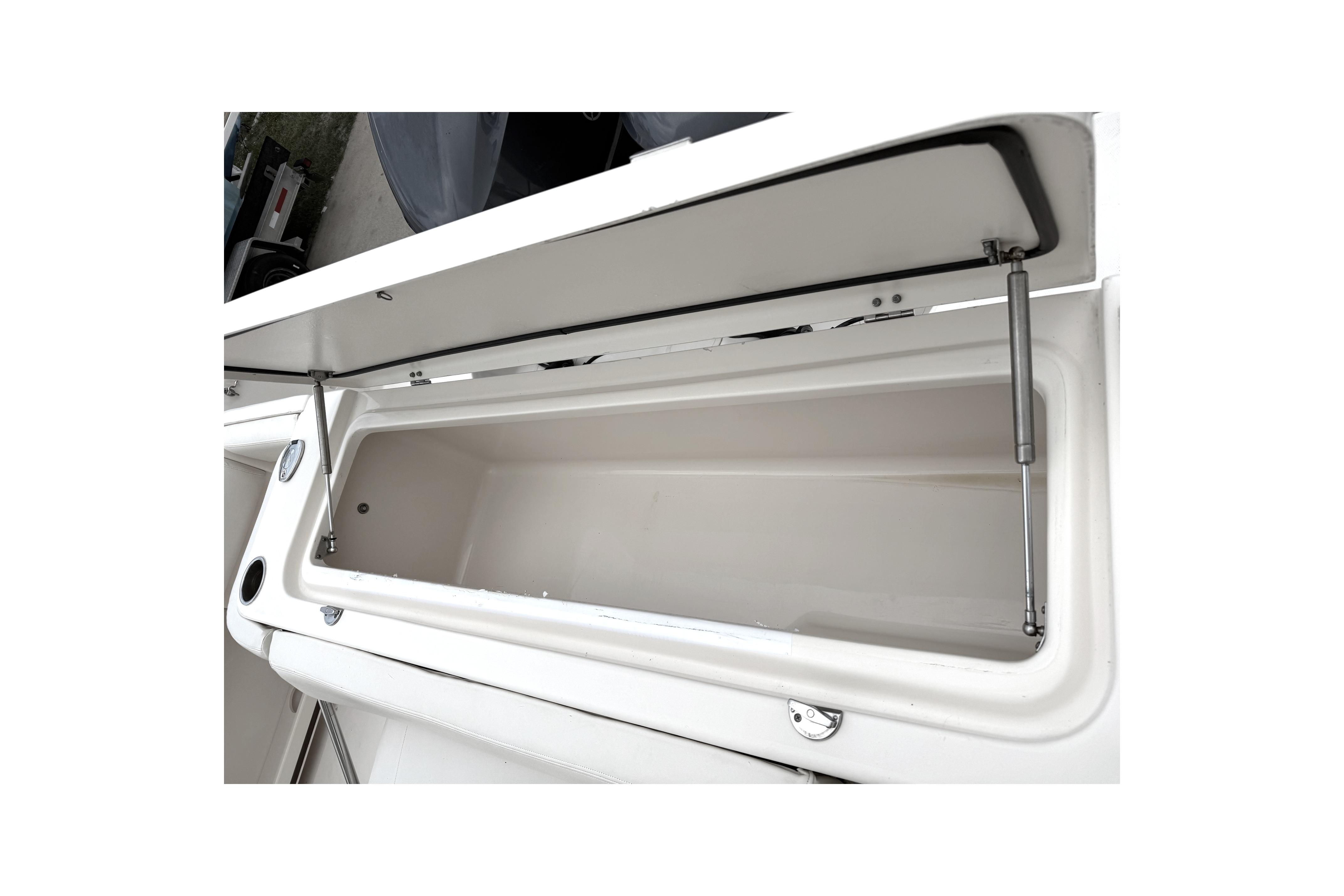 Open storage compartment on a 2018 Grady-White Canyon 306 boat.