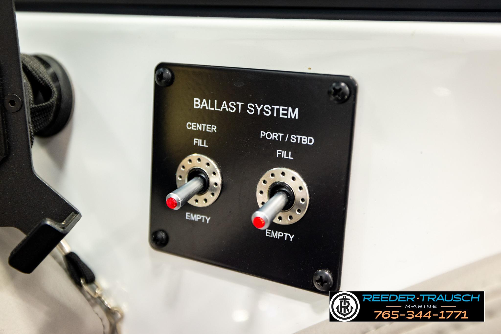 2024 FOURWINNS HD5 Surf ballast system control panel with fill and empty switches.