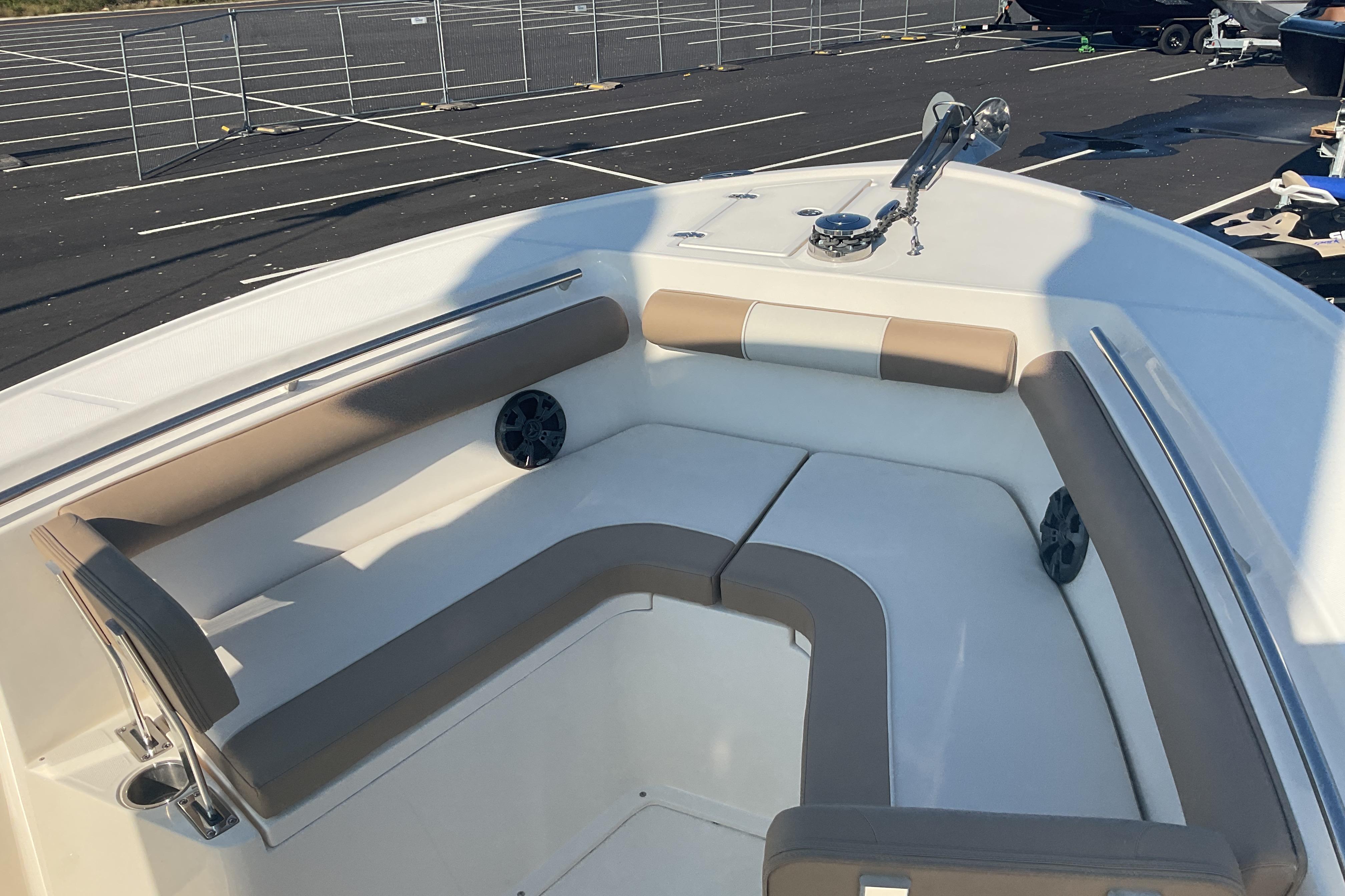 2023 Sea Born SX239 Offshore boat interior with cushioned seating and anchor.