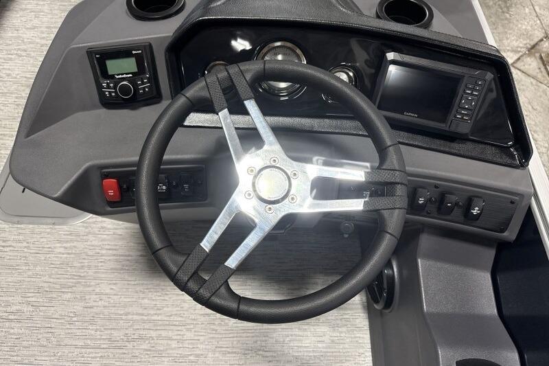 Steering console of 2026 Bennington 23 SSRSF boat with modern controls and display.