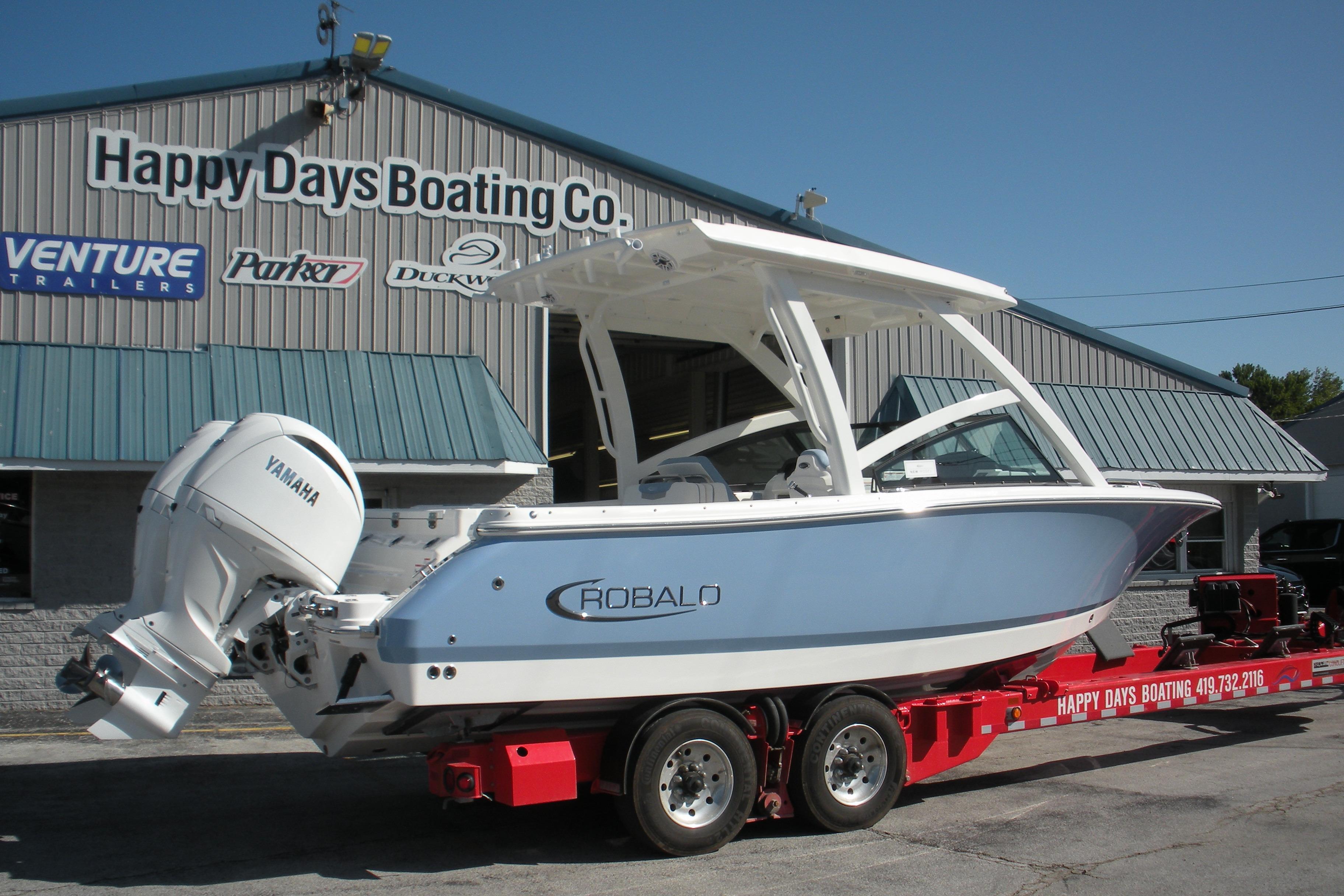 2026 Robalo R257 Dual Console boat on trailer at Happy Days Boating Co.