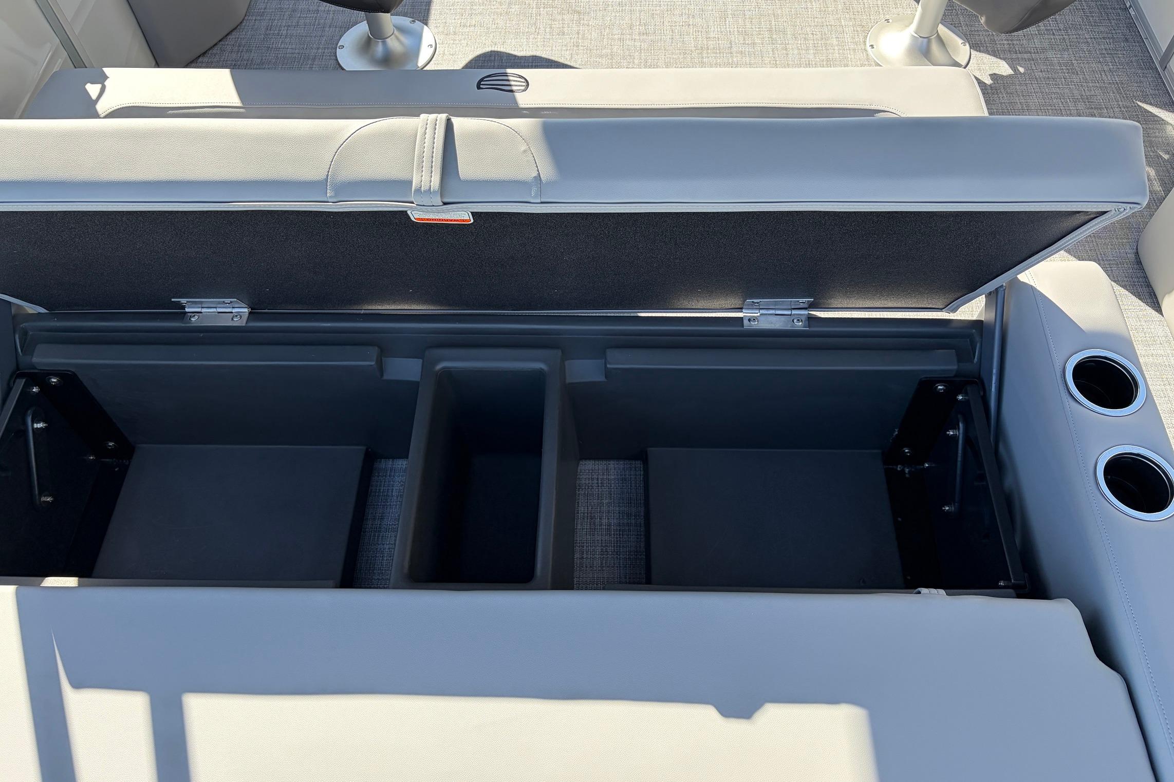 Open storage compartment on 2026 Sun Tracker Party Barge 22 RF XP3 boat.
