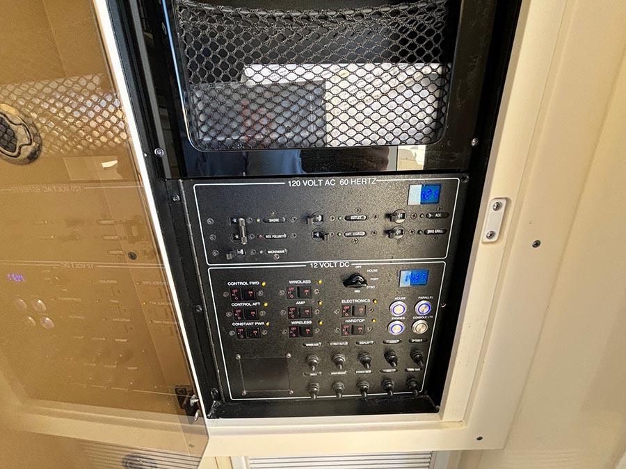 Control panel of a 2016 Scout 350 LXF boat, featuring various switches and indicators.