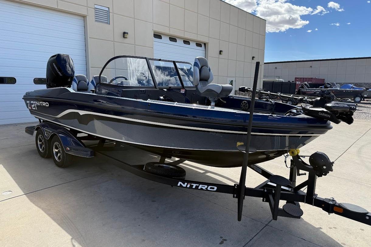 2026 Nitro ZV21 Pro fishing boat on trailer, parked outdoors.