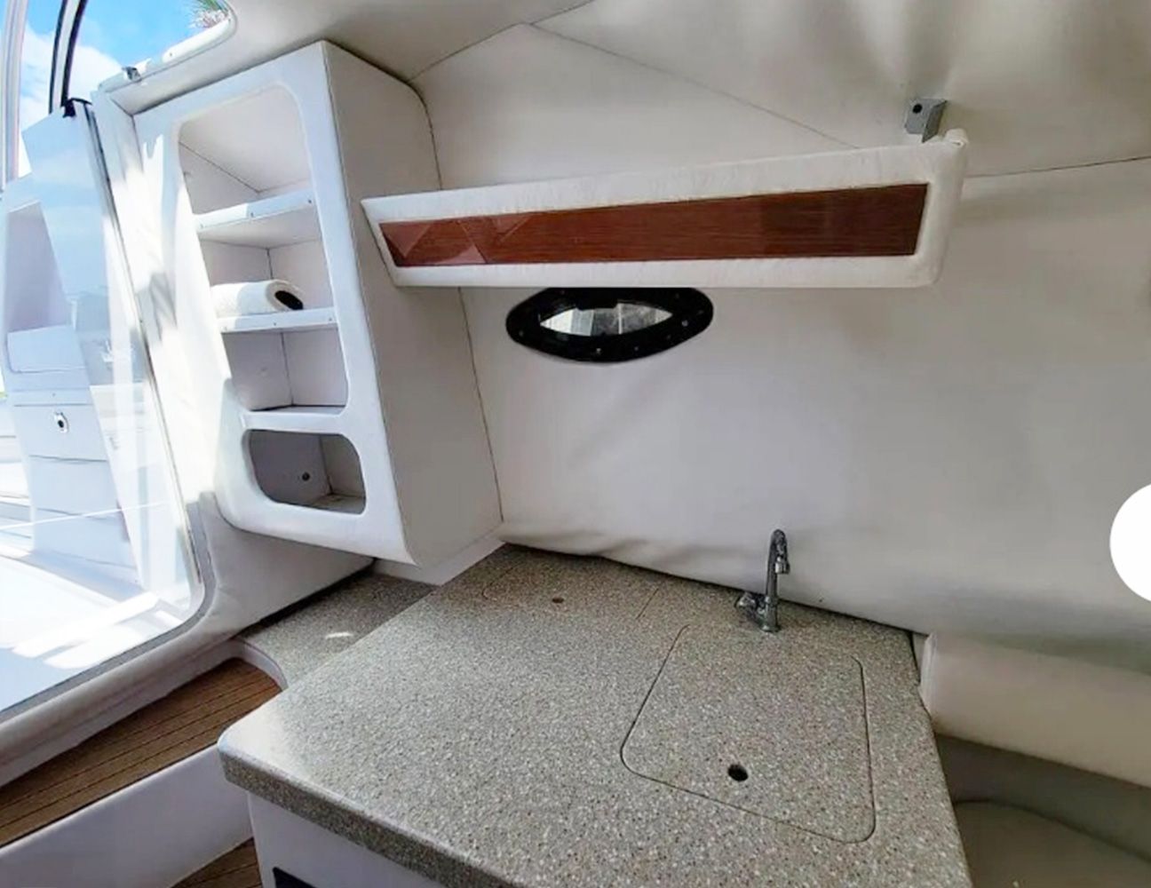 Interior of a Pro-Line 32 Express with sink and shelves.
