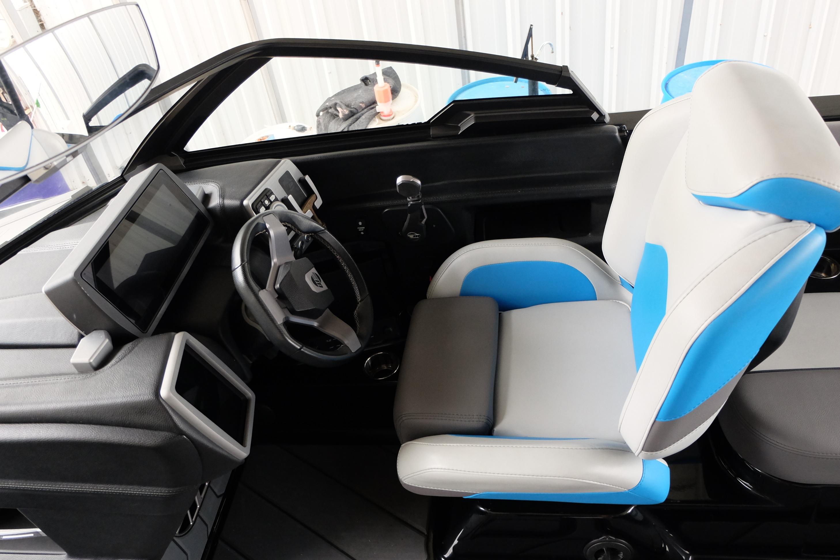 Interior of 2020 Malibu Wakesetter 23 LSV boat with modern dashboard and seating.