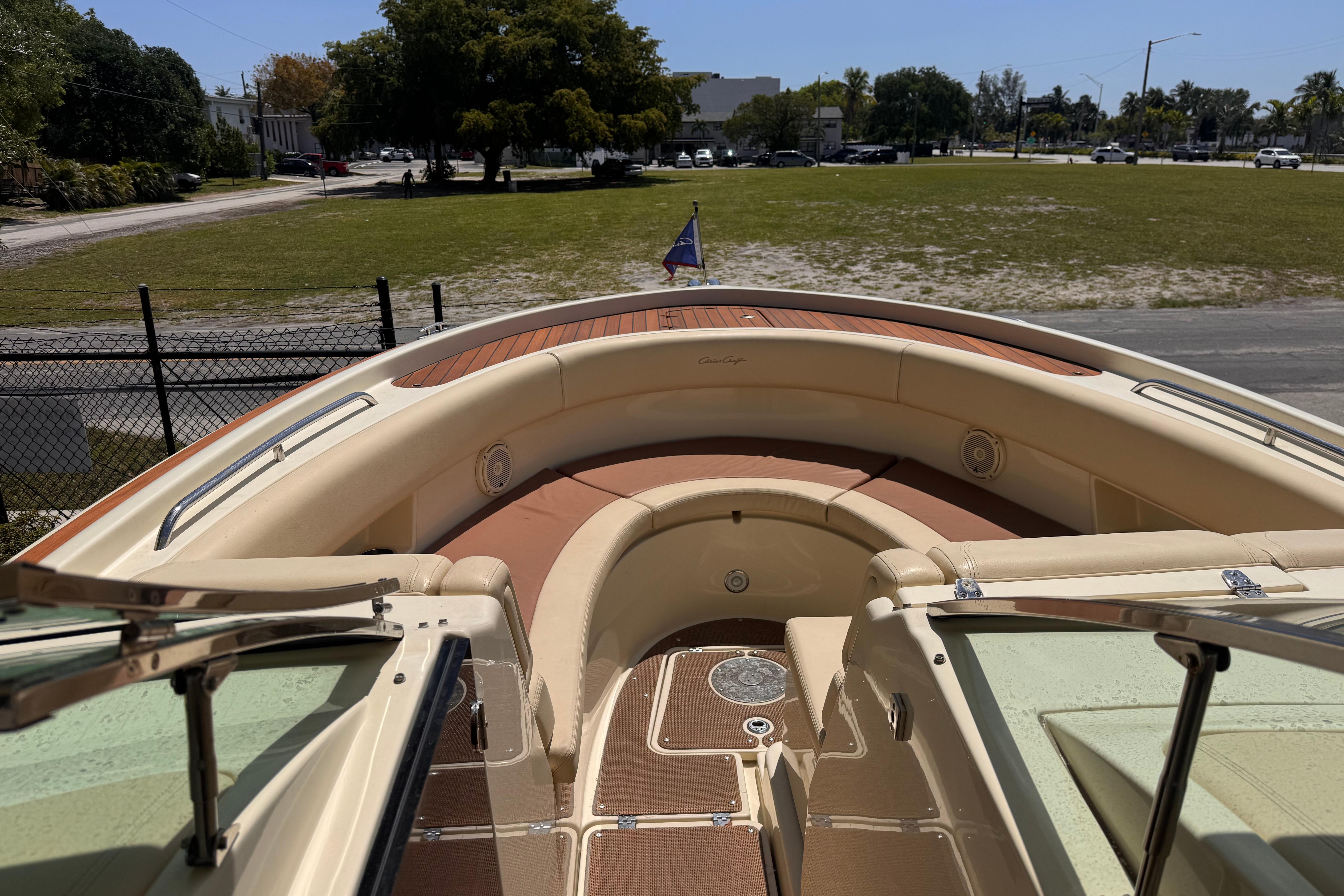 2018 Chris-Craft Calypso 30 boat interior with seating and deck view.
