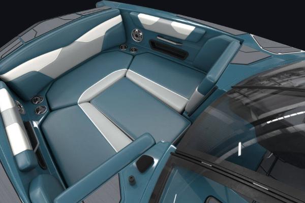 Manufacturer Provided Image: 2022 Axis A22 boat interior with blue and white seating.