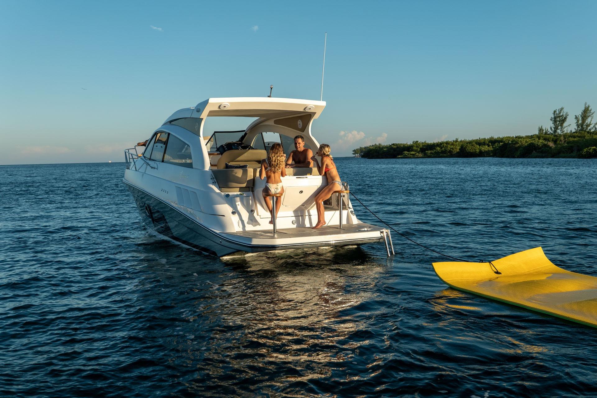 2026 Hanover 375 yacht with people enjoying a sunny day on the water.