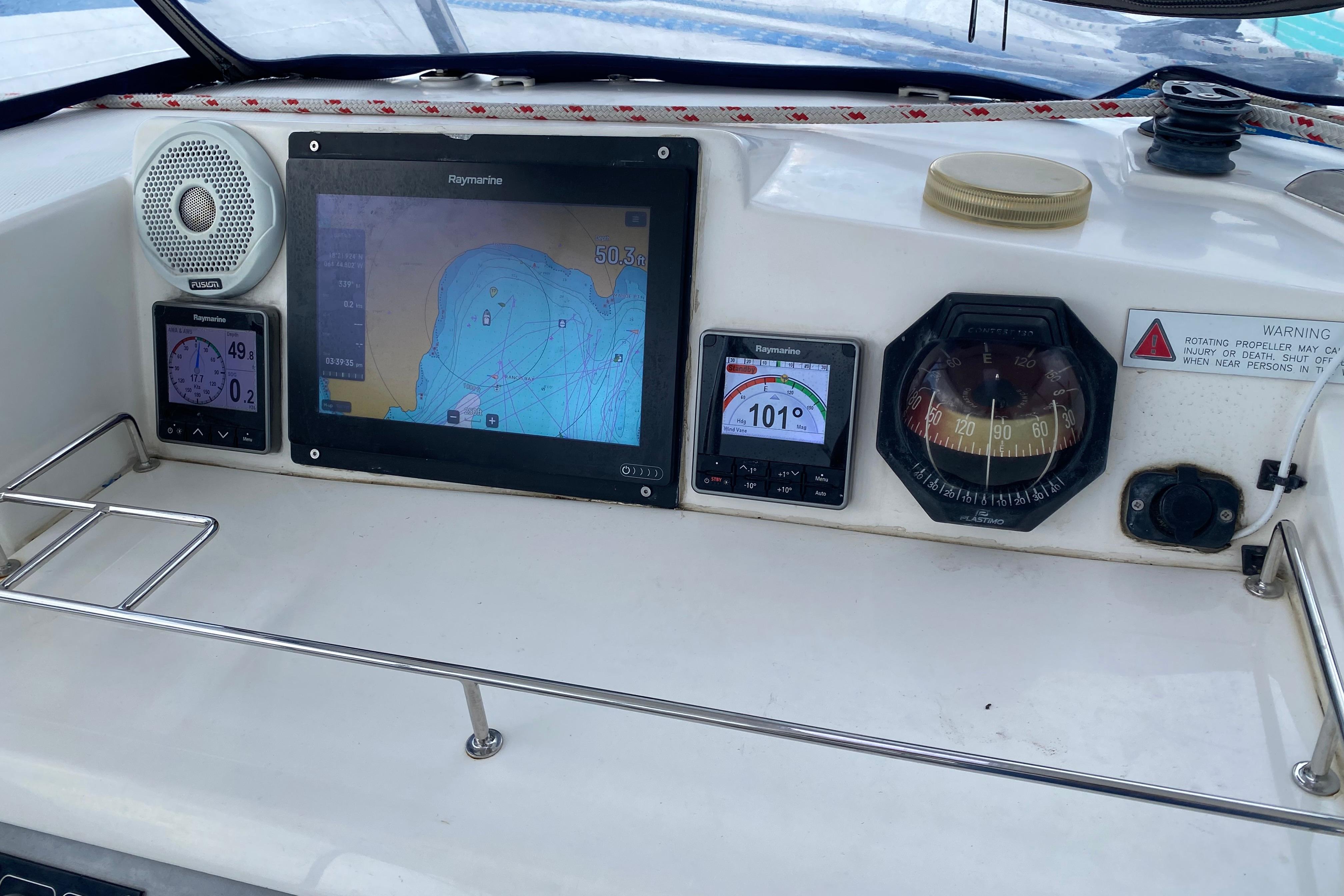 Control panel of a 2017 Leopard 40 catamaran with navigation instruments and display.