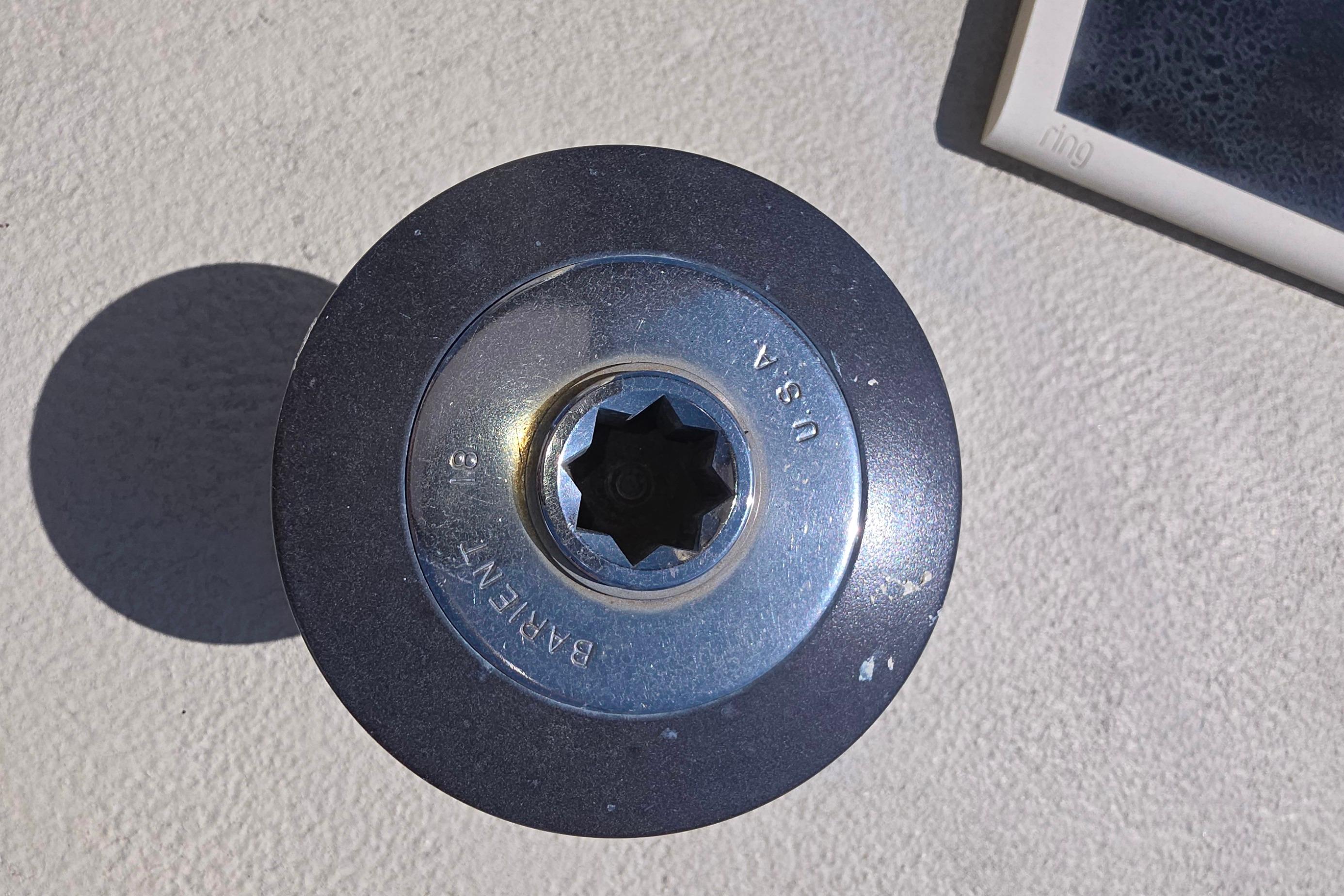 Winch handle socket on 1978 Islander Freeport 41 sailboat deck.