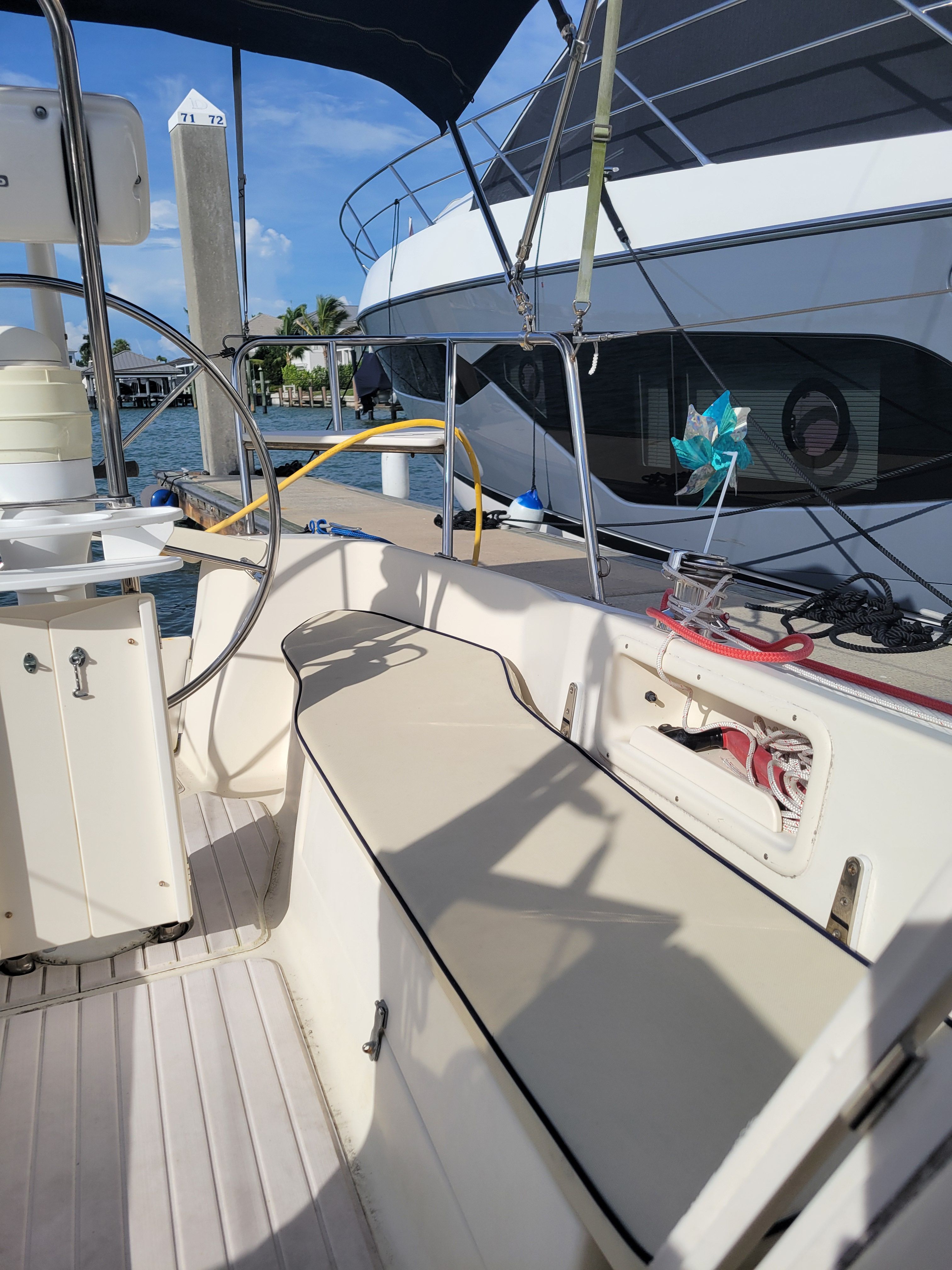2018 Hake Seaward 26 RK sailboat docked at marina.