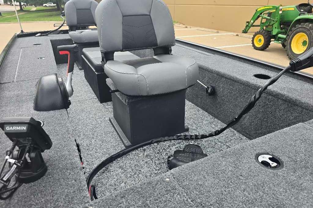 2026 Tracker Panfish 17 boat interior with seating and Garmin equipment.