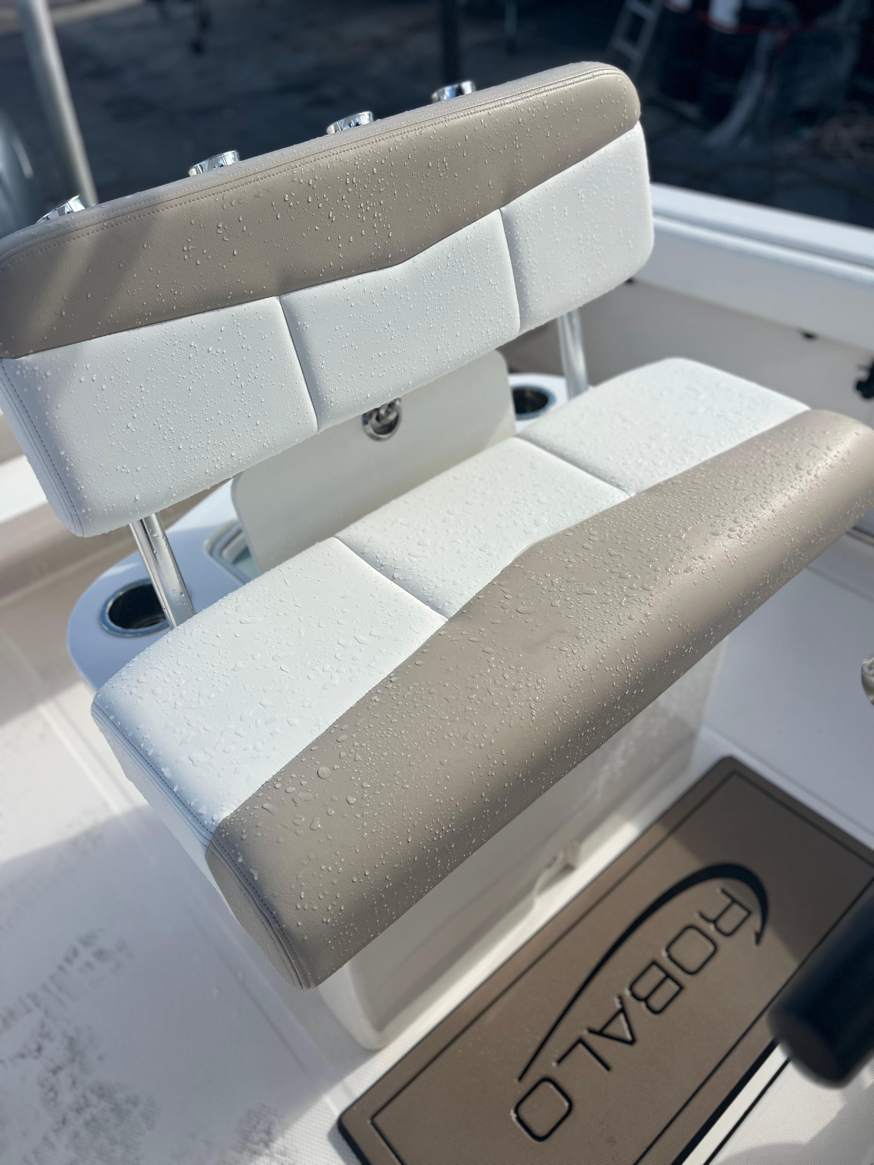2022 Robalo R222 Center Console boat seat with water droplets.