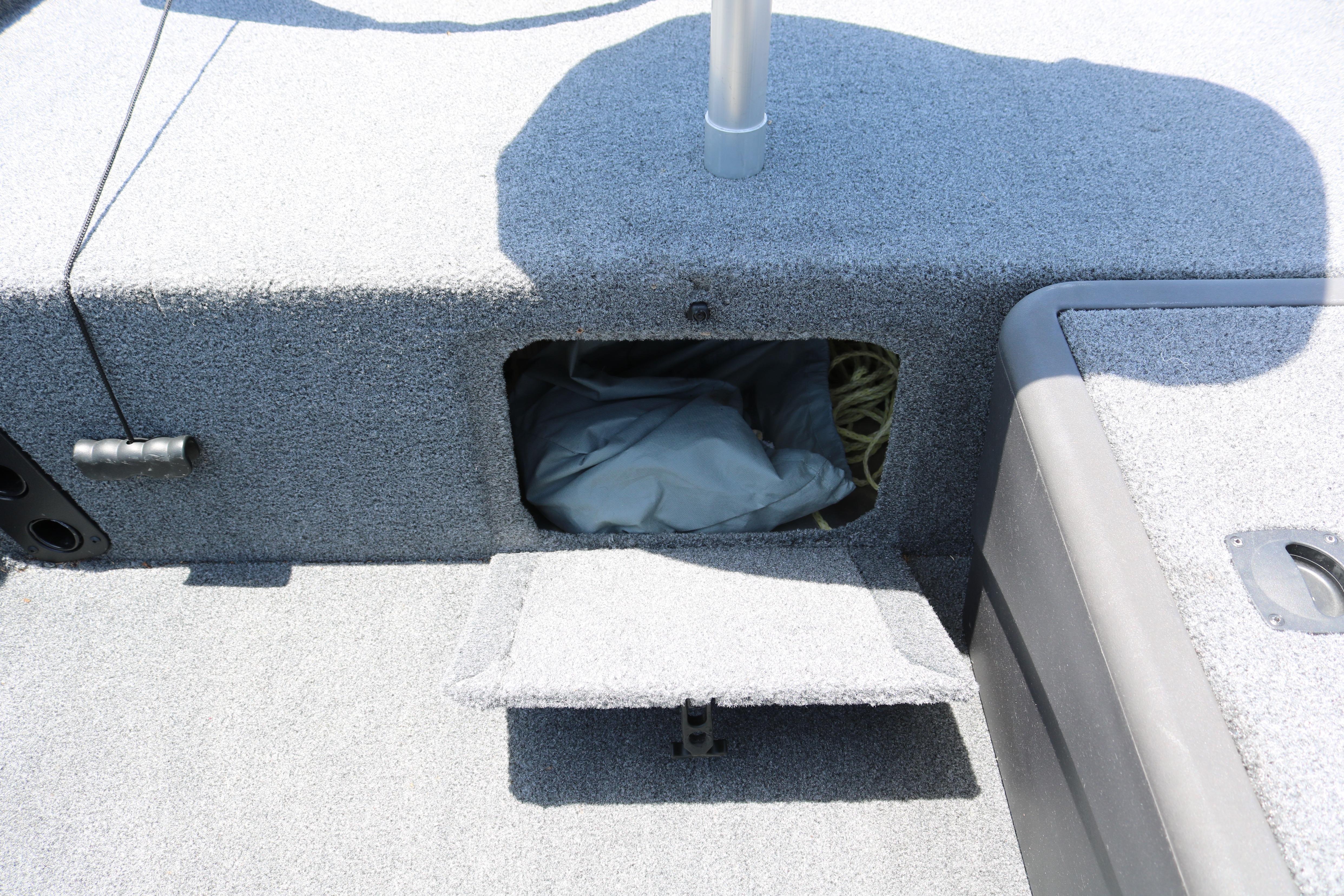 Storage compartment in 2021 Tracker Bass Tracker Classic XL boat interior.