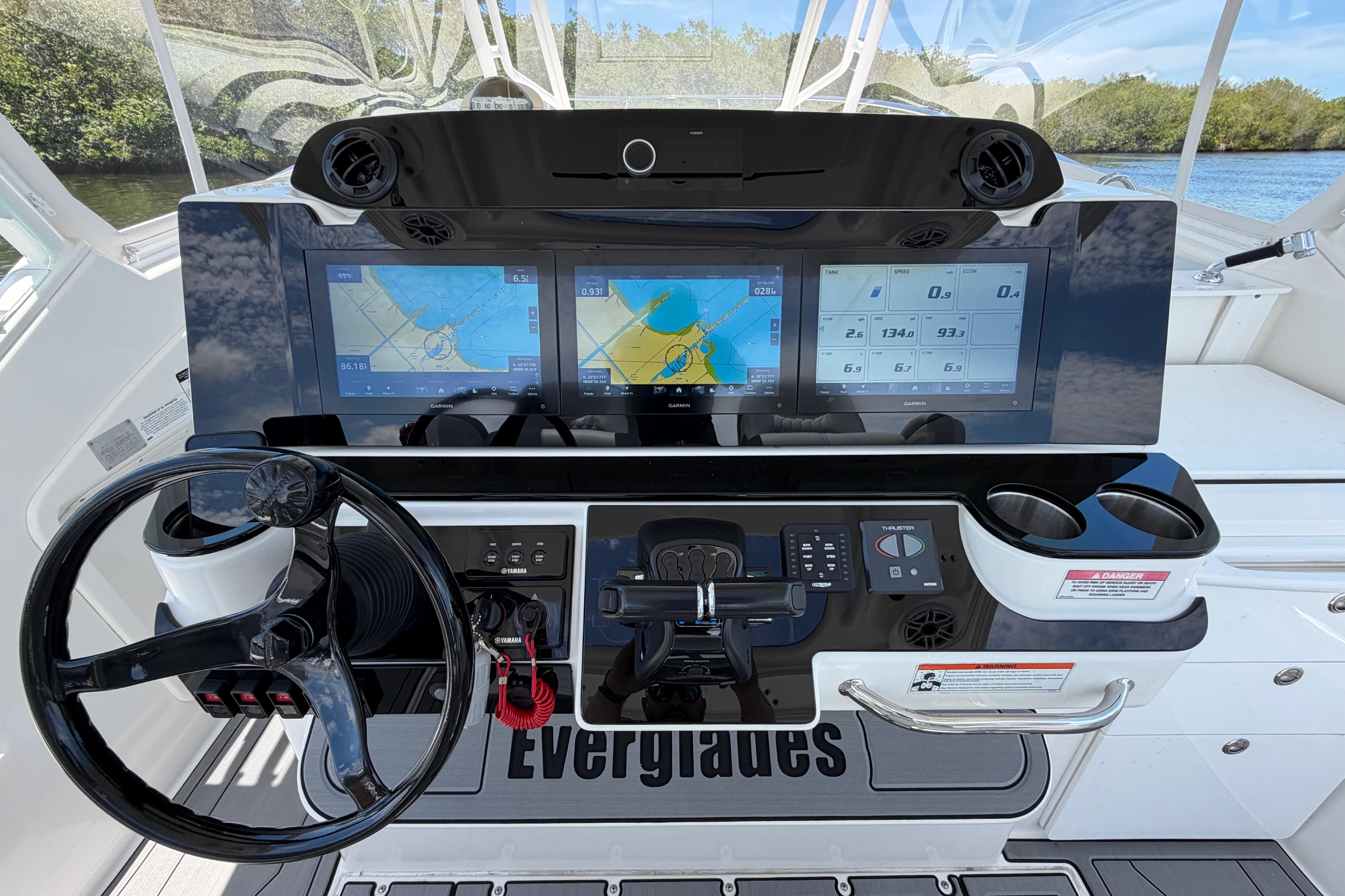 Cockpit of 2009 Everglades 350LX boat with advanced navigation displays and controls.