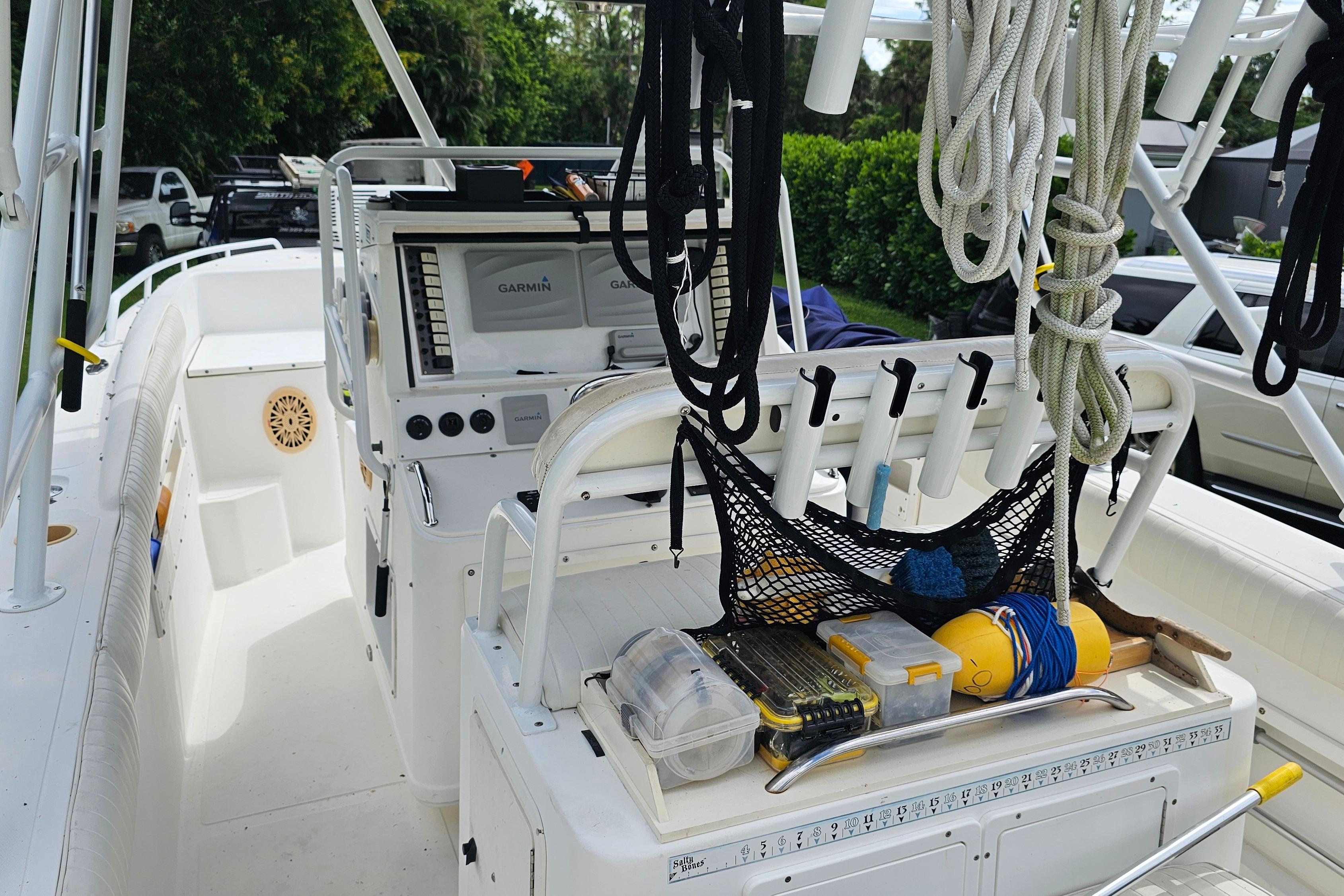 1993 Marlin 350 Sportfish boat deck with fishing gear and ropes.