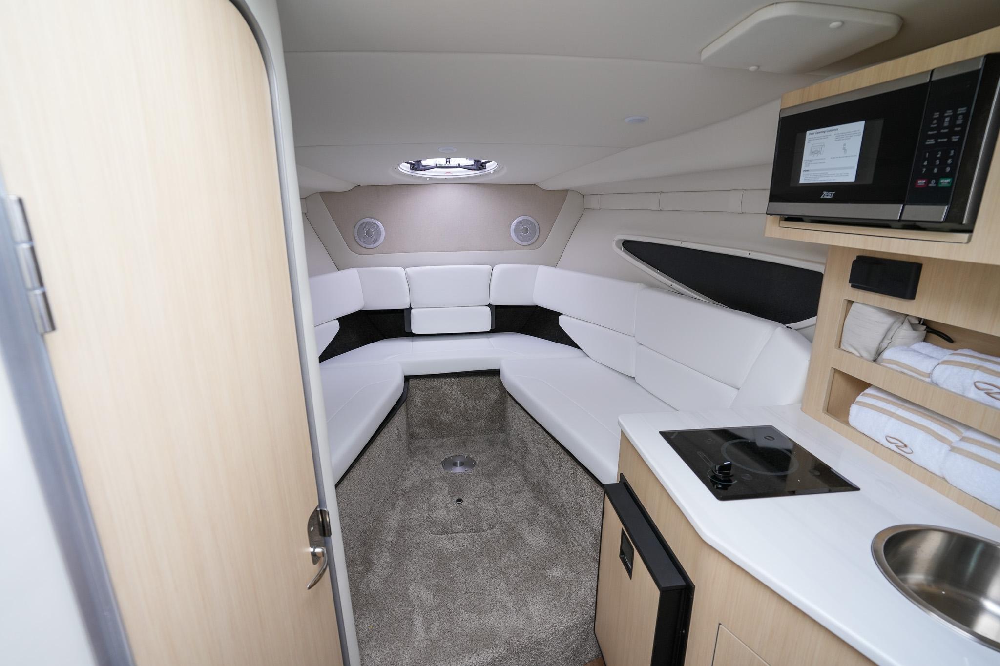 Luxurious interior of 2026 Regal 26 XO boat with modern amenities and sleek design.