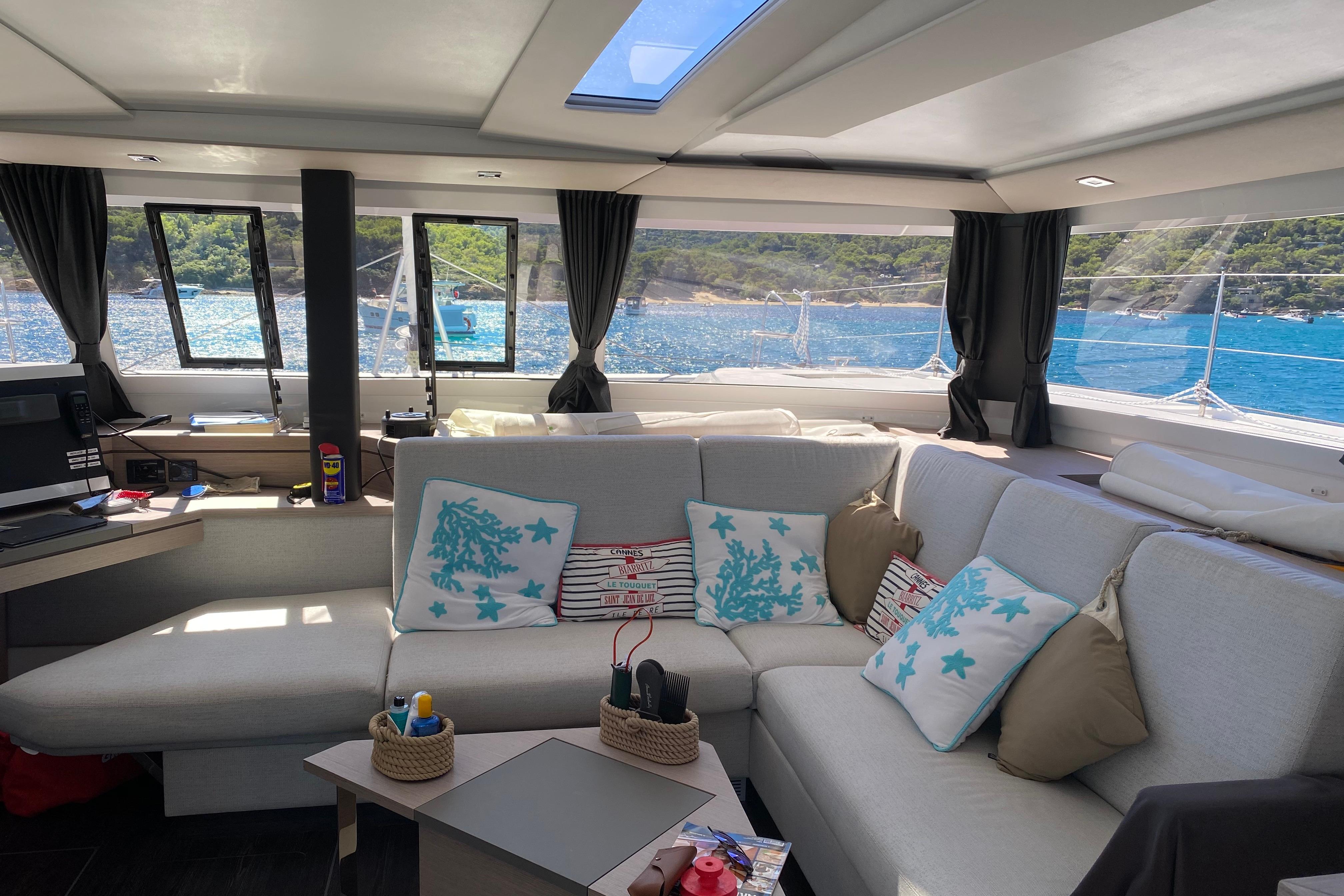 Luxurious interior of 2020 Fountaine Pajot Saona 47 catamaran with scenic ocean view.