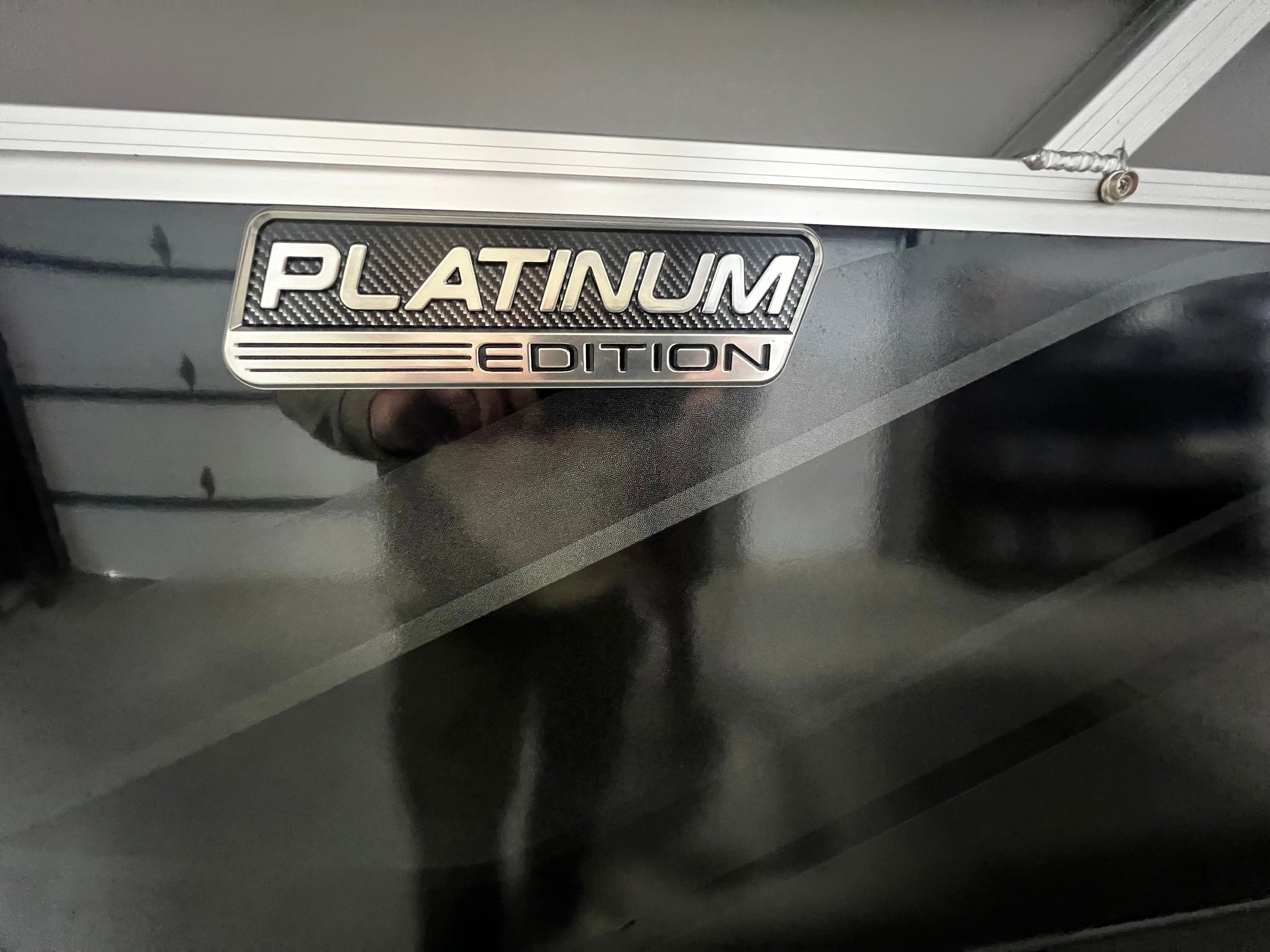 2026 Tahoe 2180 Sport Quad Lounger Platinum Edition Emblem.