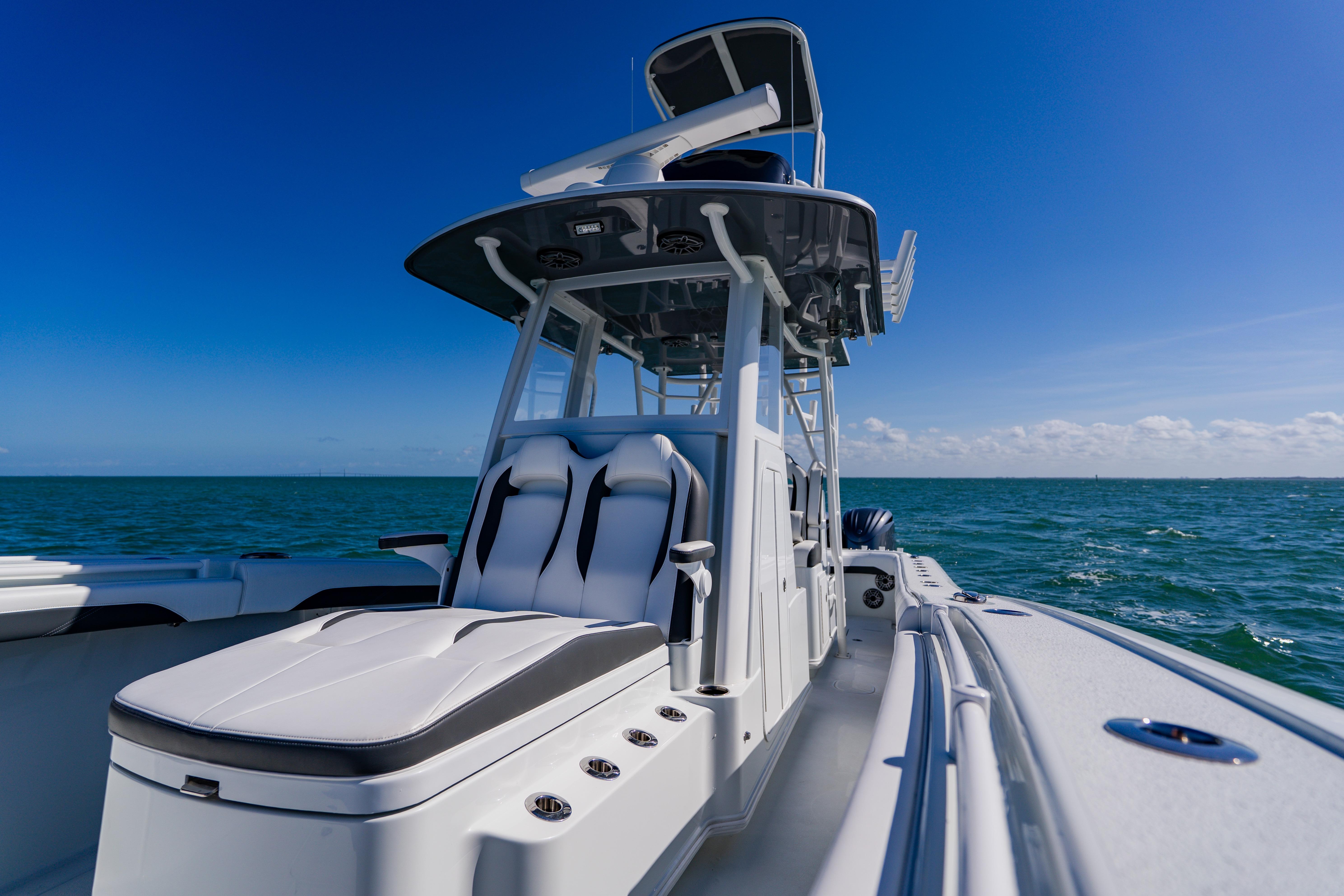 2025 Yellowfin 36 Offshore boat on open sea under clear blue sky.