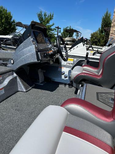 2025 Nitro Z20 XL Pro boat interior with steering console and seating.