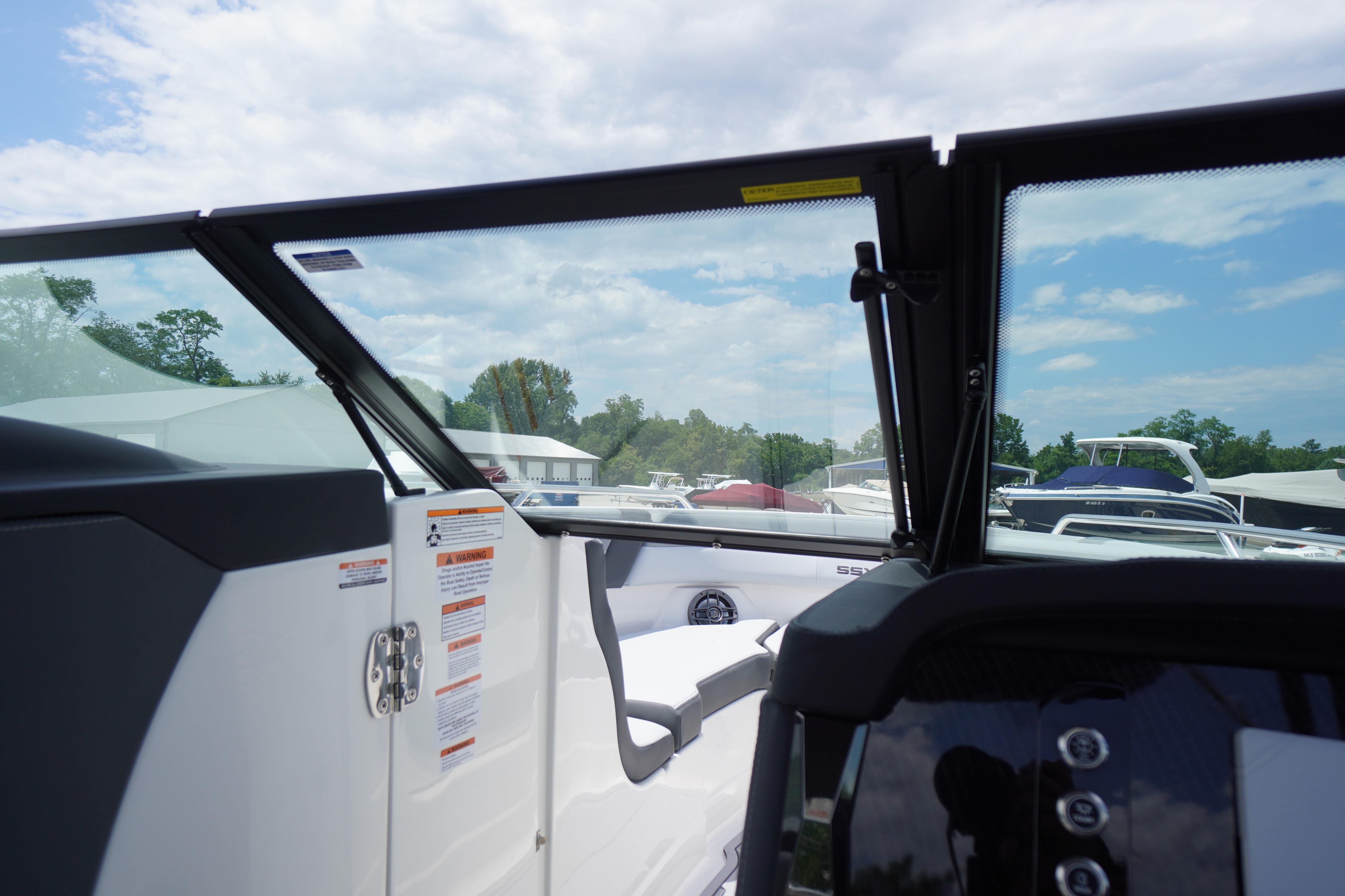 2026 Chaparral SSX 4 boat interior with open windshield and dashboard view.