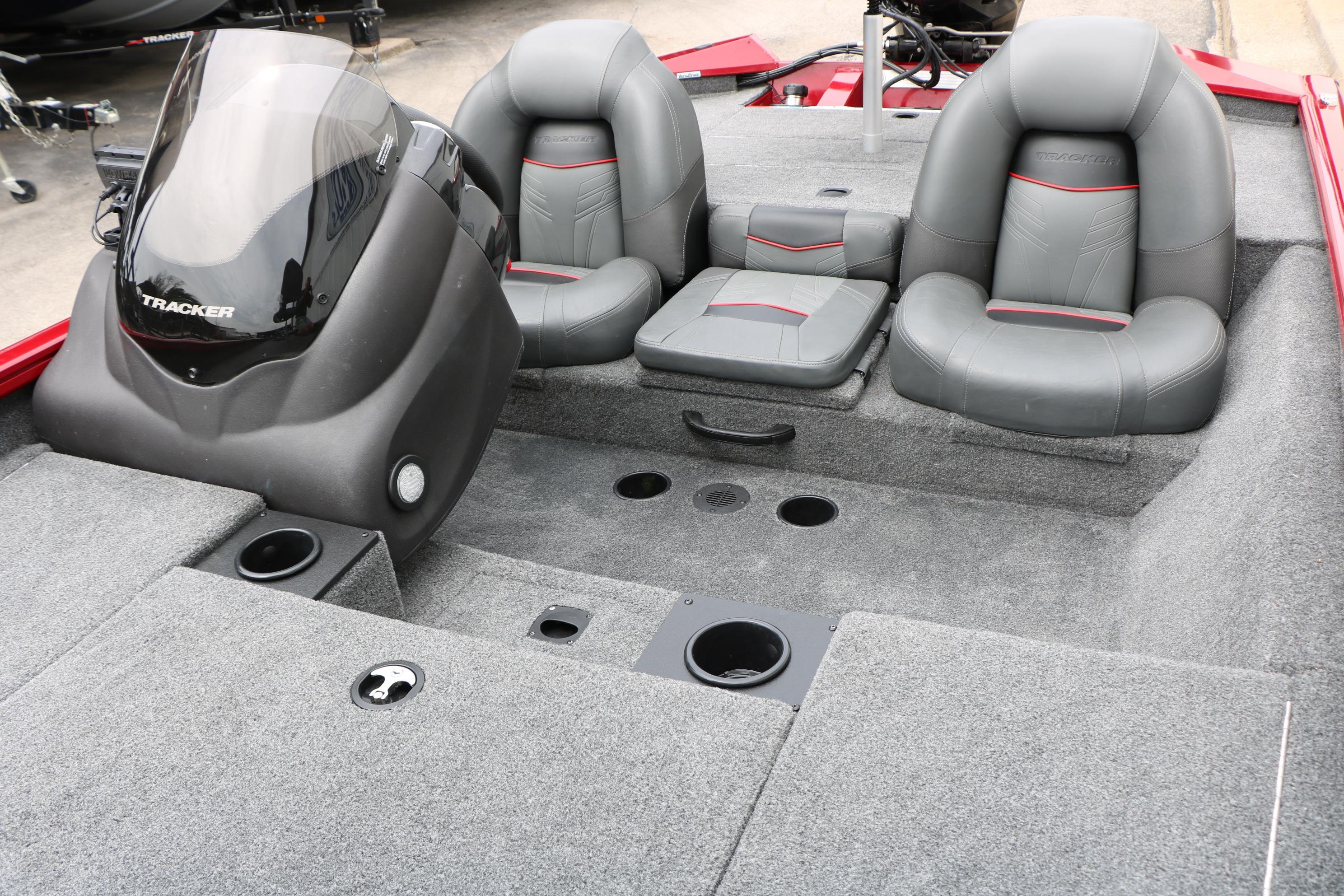 2024 Tracker Pro Team 175 boat interior with gray seating and carpeted deck.