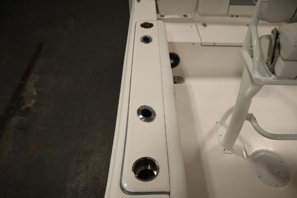 2025 Sea Fox 228 Commander boat interior with rod holders and seating.