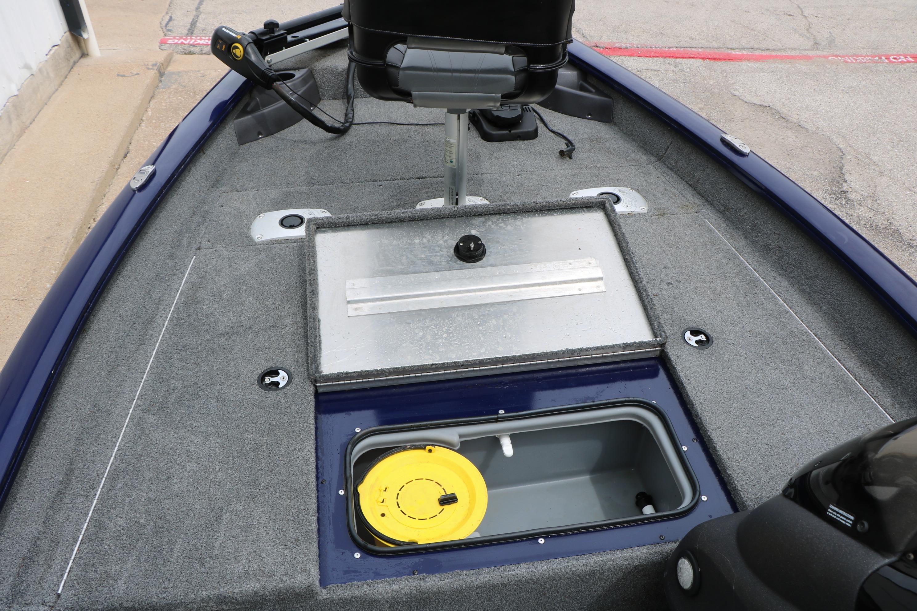 2022 Tracker Pro Team 175 TF boat deck with storage compartments and seating.