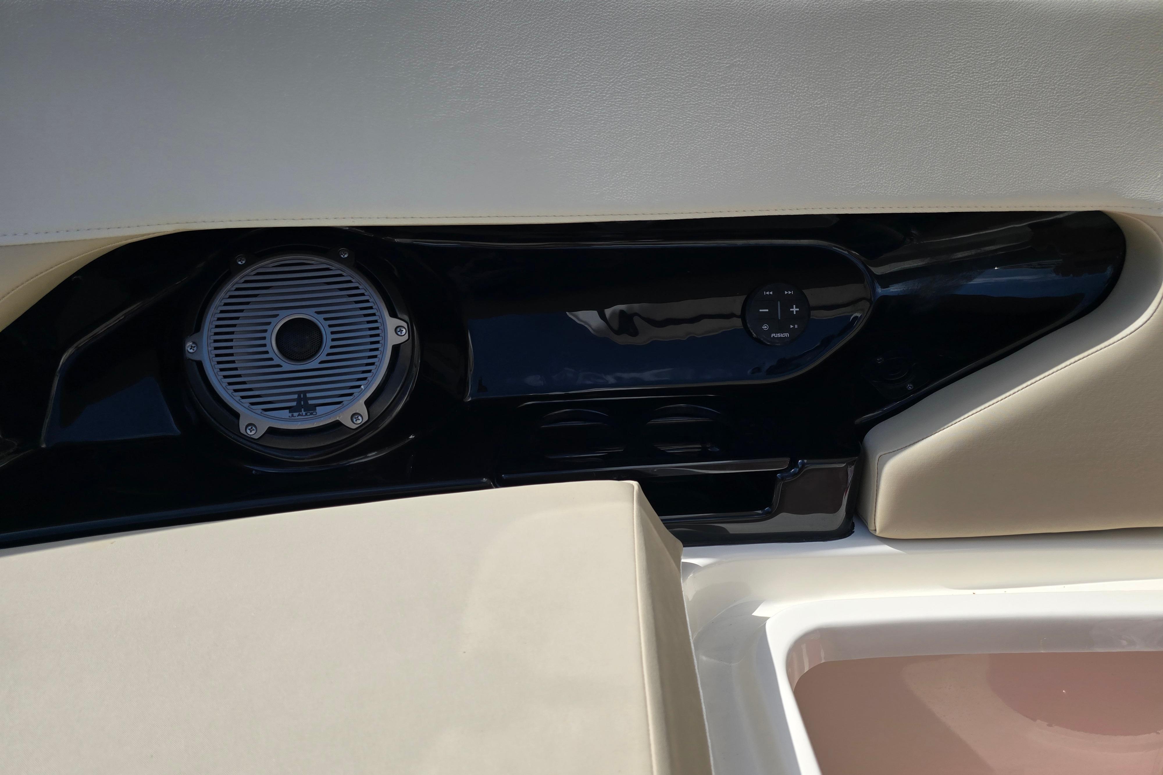 Interior detail of 2022 Boston Whaler 240 Vantage boat with speaker and controls.