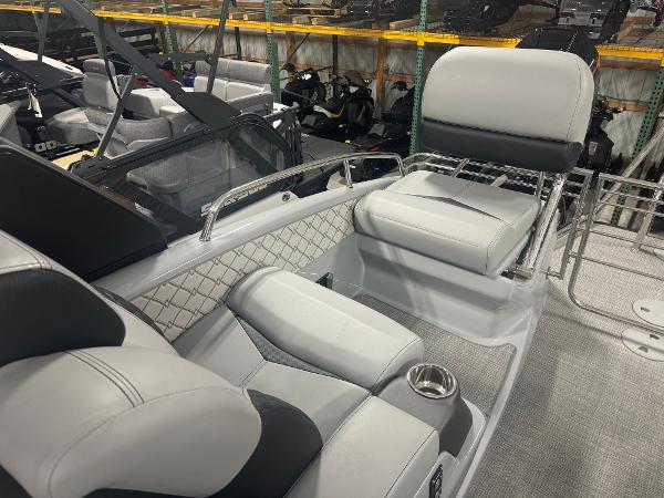 2025 Manitou LX boat interior with luxurious seating and modern design.