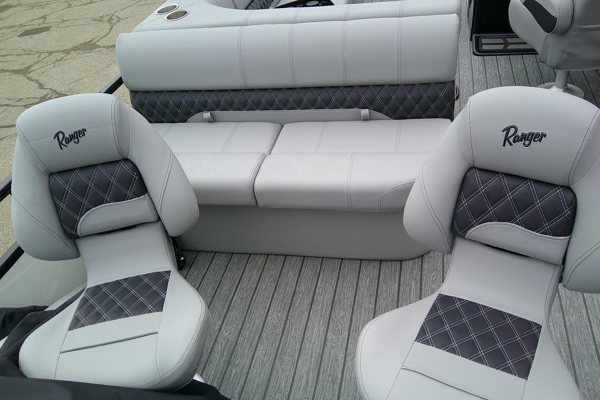 Luxurious interior of 2026 Ranger 220F boat with stylish seating and elegant design.