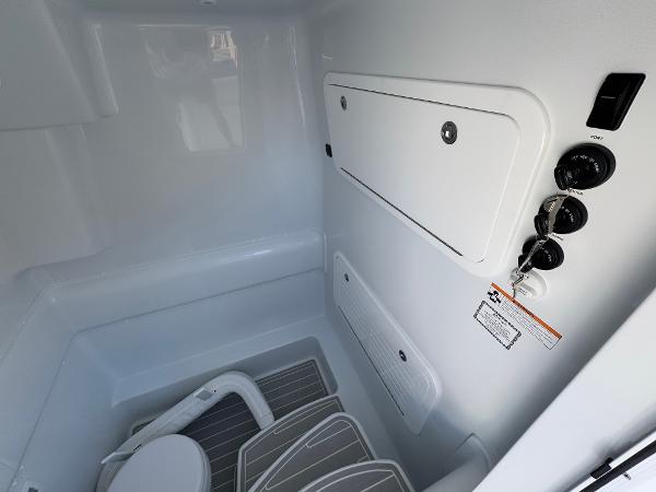 2025 Yellowfin 39 Offshore boat interior with storage compartments and seating.