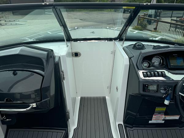 2018 Monterey 258 Super Sport boat interior with dashboard and seating area.