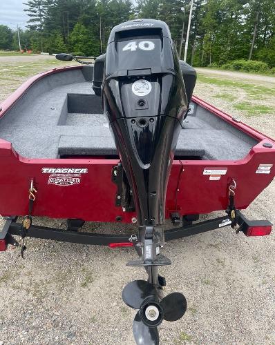 2025 Tracker Super Guide V-16 T boat with 40 HP outboard motor, red exterior.
