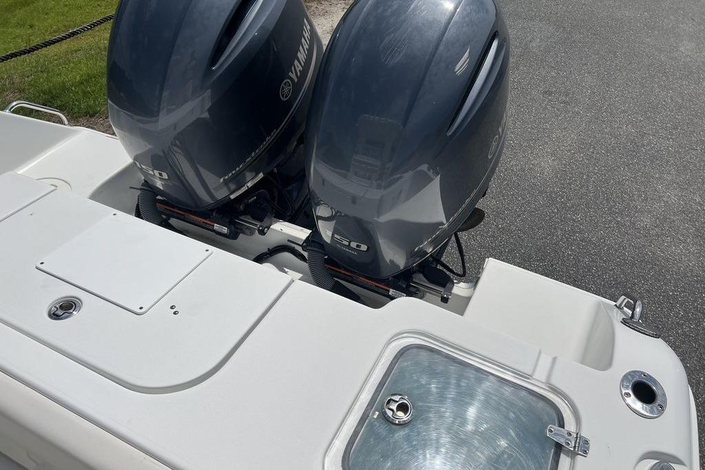 2021 Sea Hunt Gamefish 25 with dual Yamaha outboard motors, rear deck view.