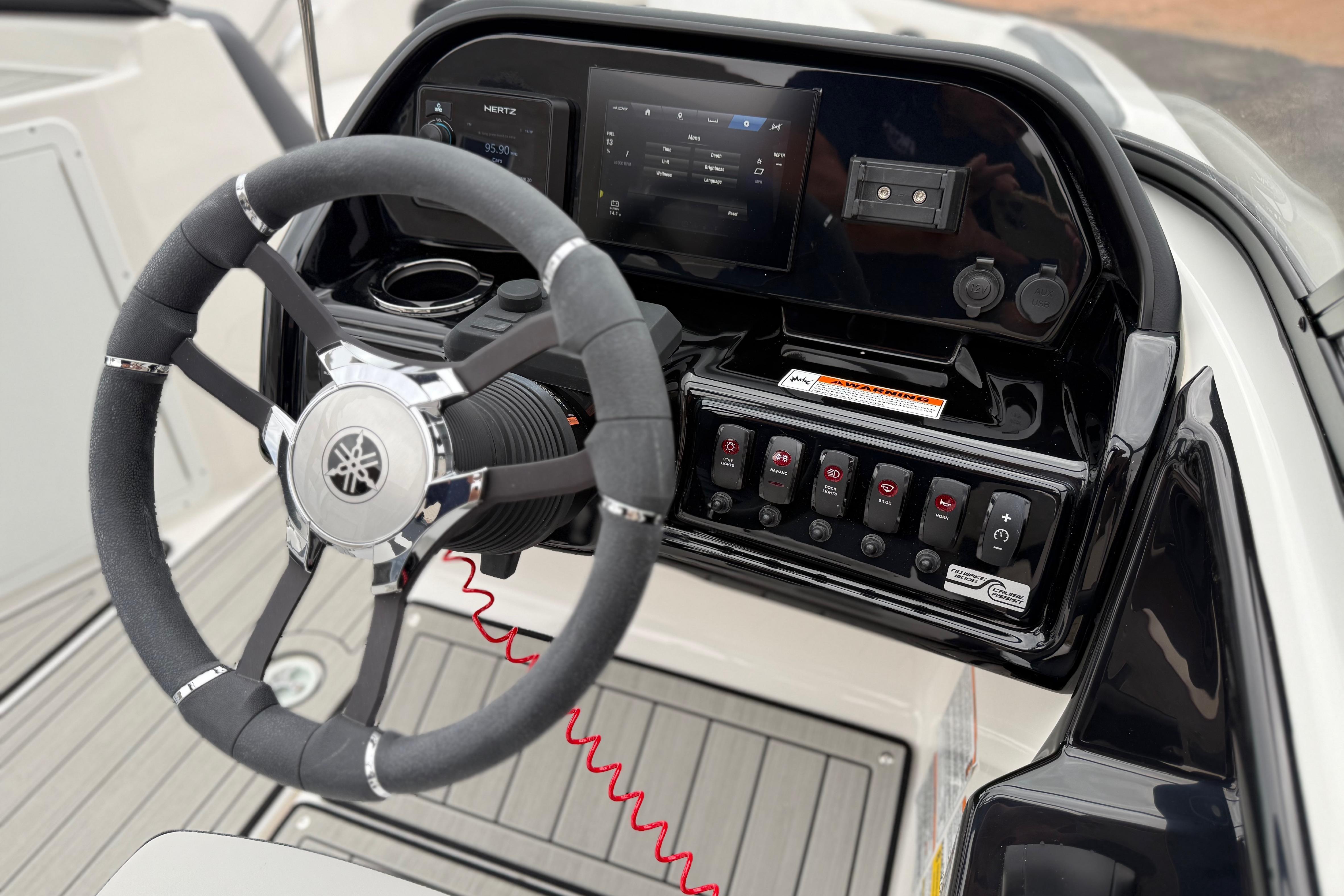 2025 Yamaha Boats 195S dashboard with steering wheel and control panel.