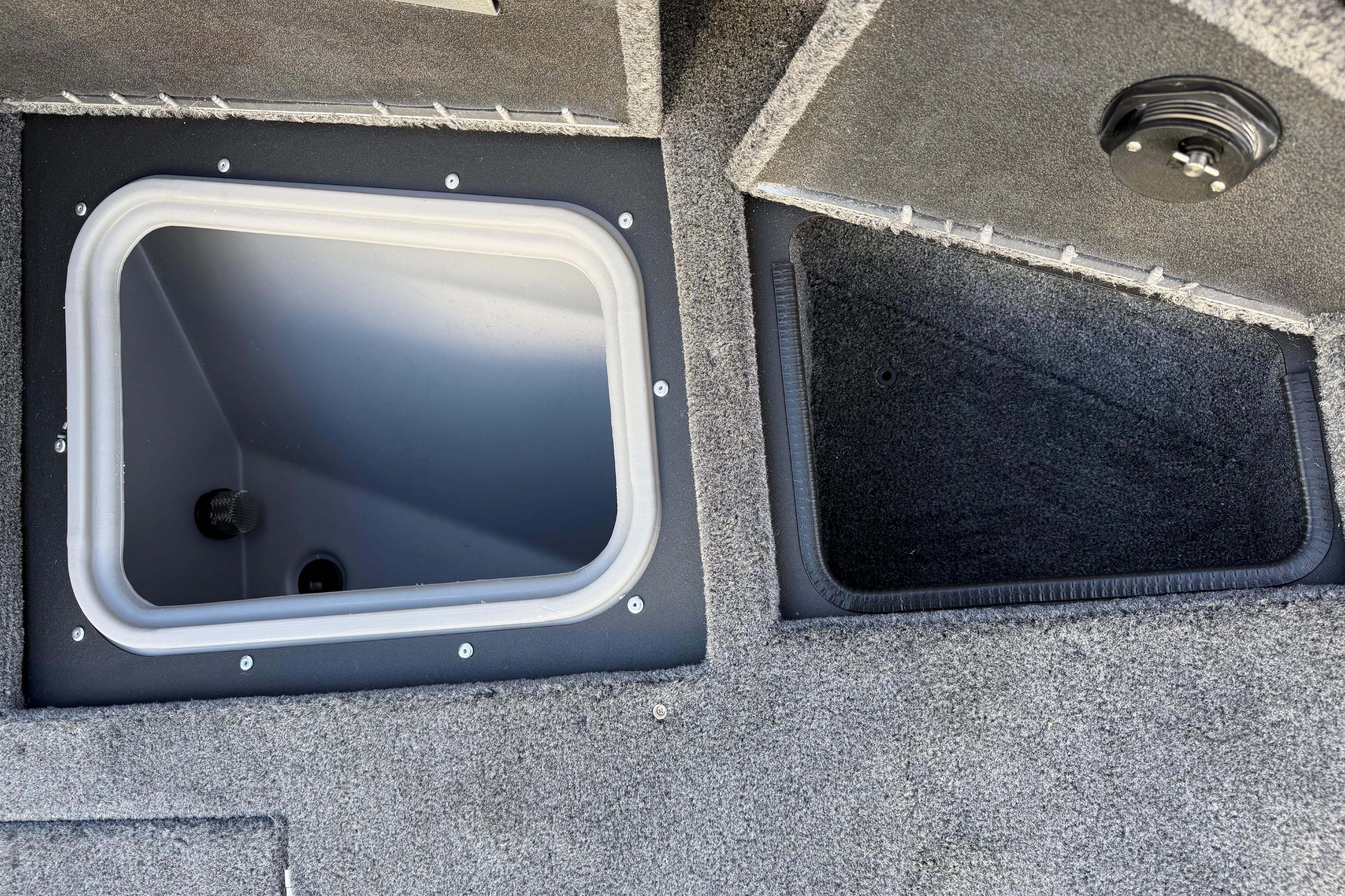 Interior compartments of 2026 Tracker Targa V-19 Combo boat, featuring storage and livewell.