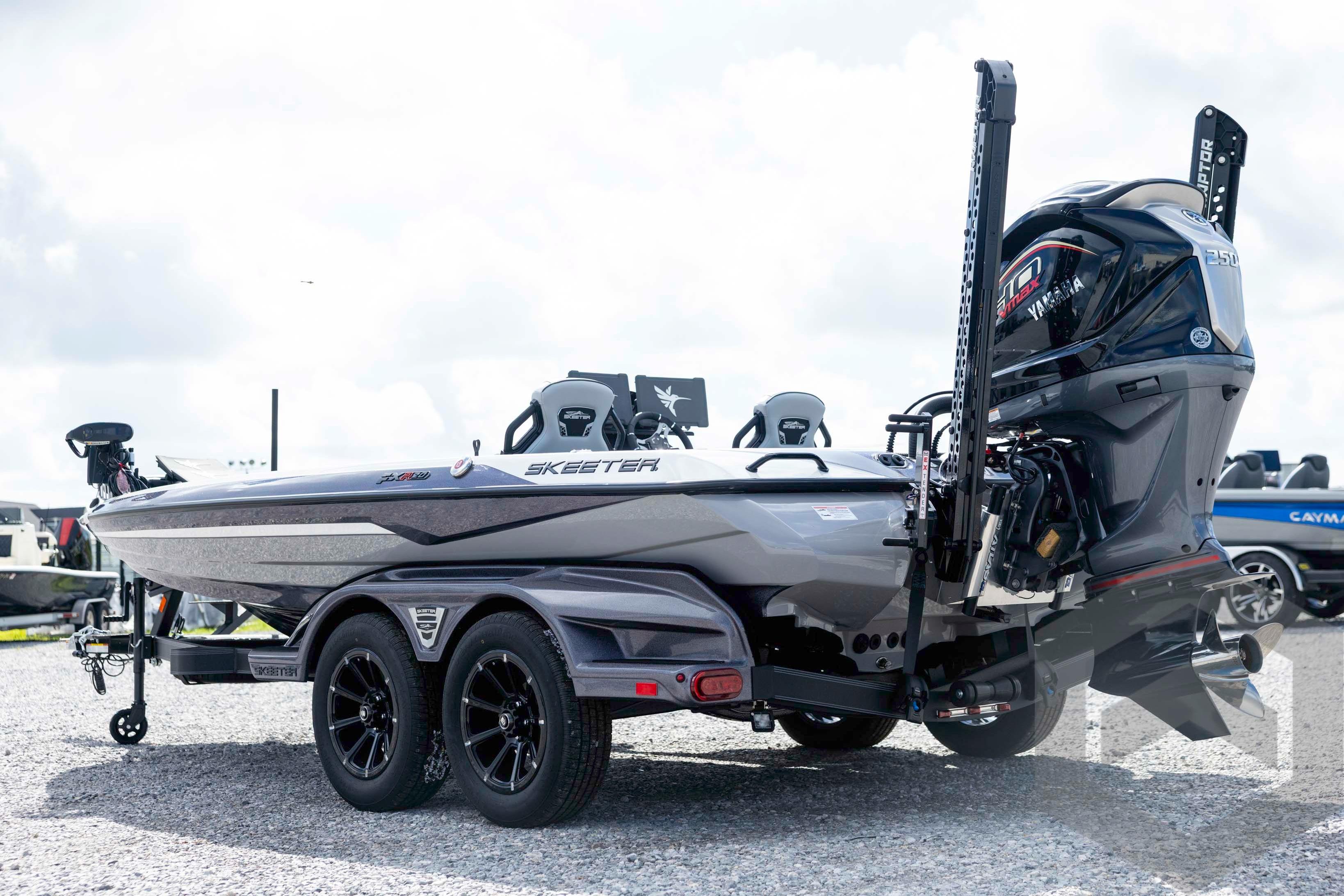 2026 Skeeter FXR20 FLEX boat with Yamaha engine on a trailer, parked outdoors.