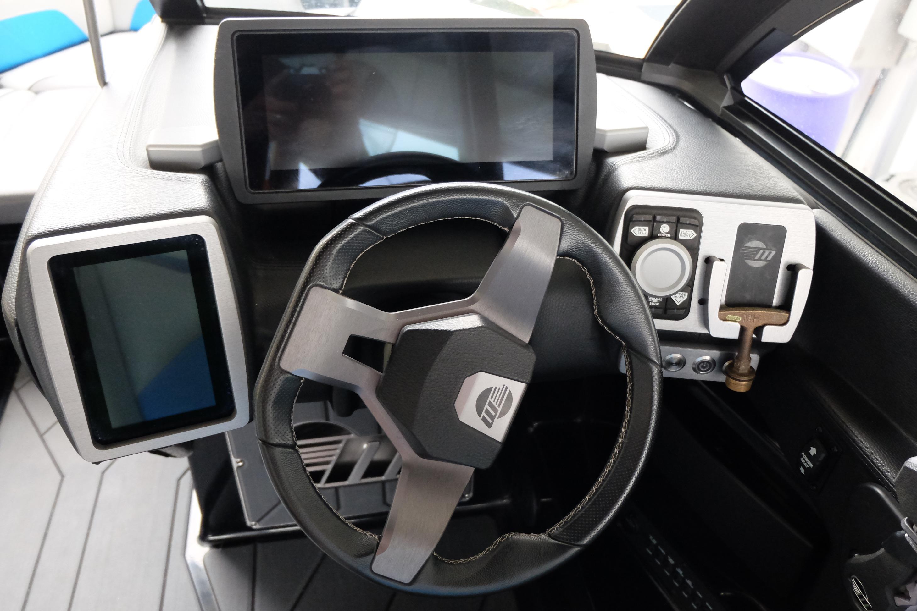 2020 Malibu Wakesetter 23 LSV dashboard with modern steering wheel and digital displays.