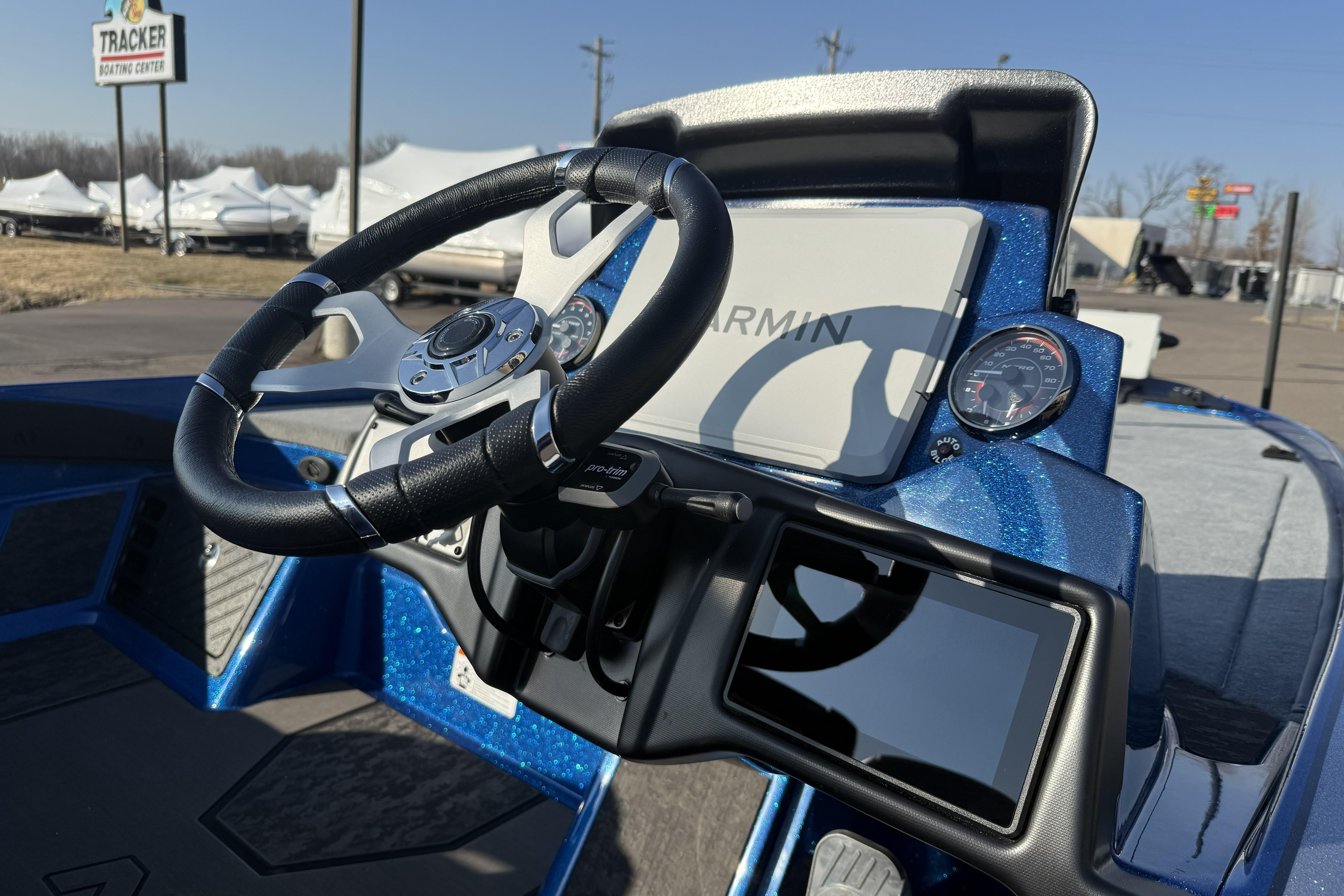 2026 Nitro Z21 XL Pro boat dashboard with Garmin display and steering wheel.