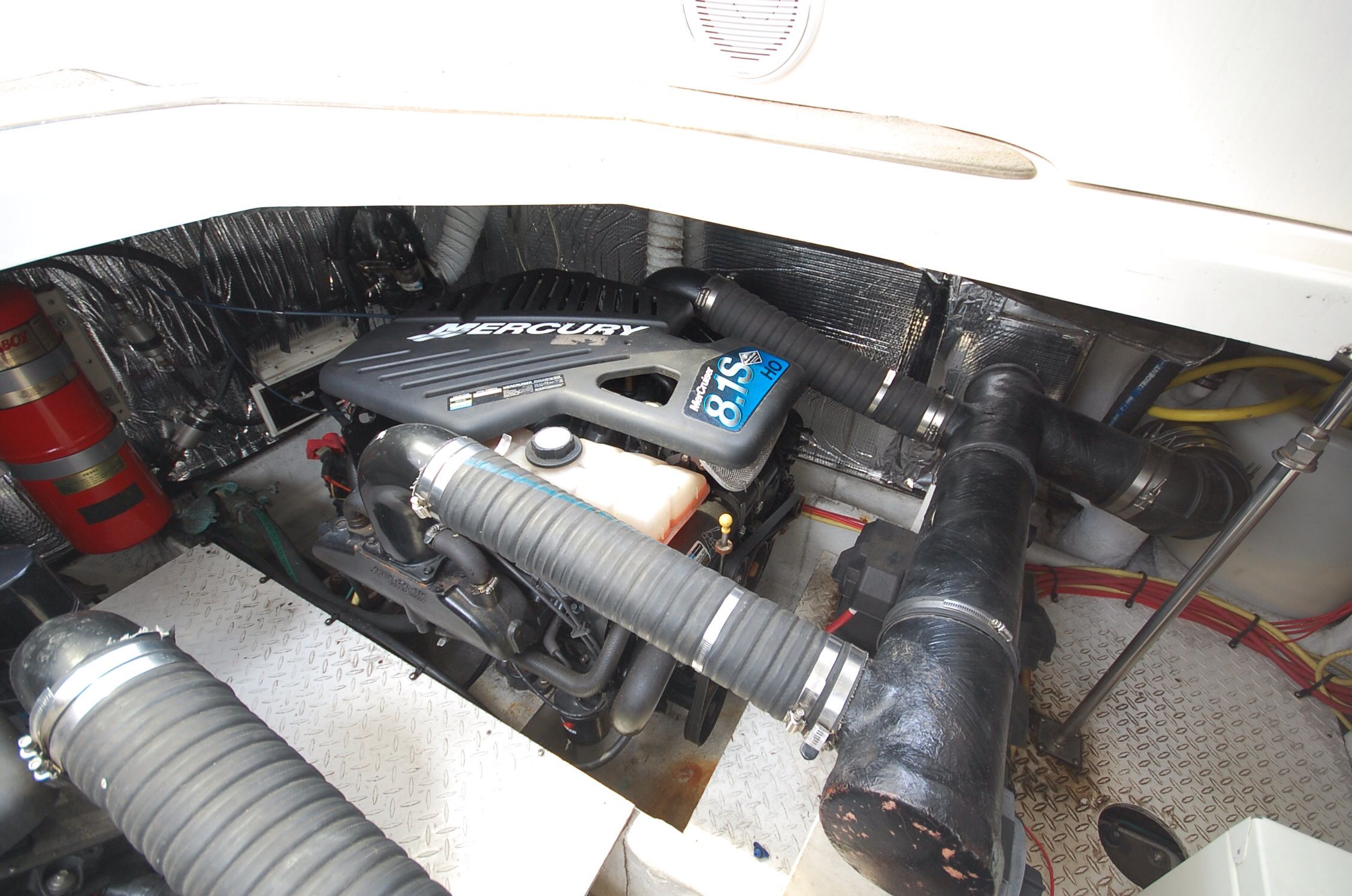 Engine room of a 2004 Cruisers Yachts 3970 with Mercury 8.1S engine.