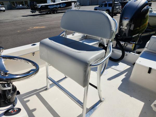2023 May-Craft 208 CC boat with sleek seating and powerful outboard motor.