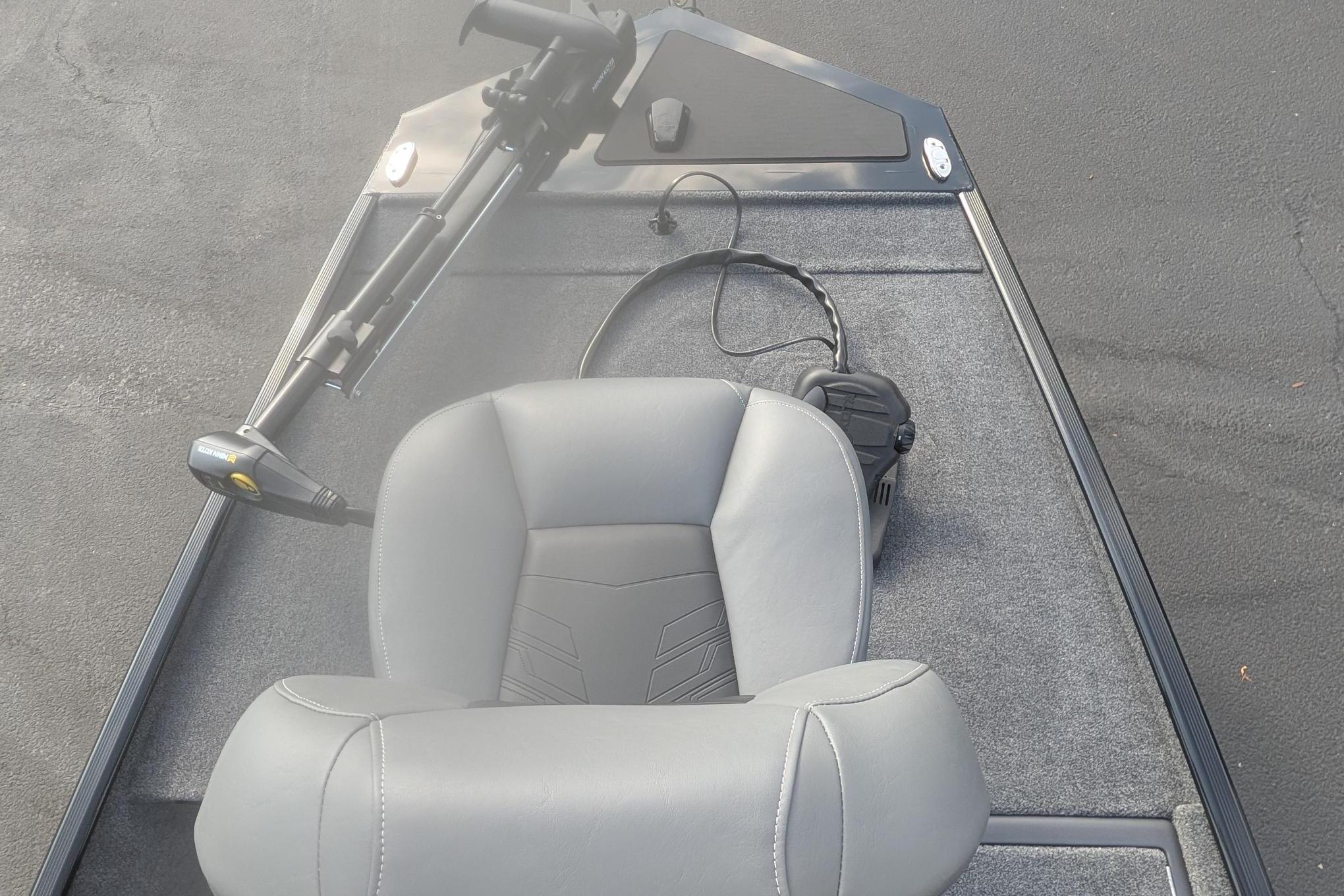 2026 Tracker Bass Tracker Classic XL boat interior with gray seating and trolling motor.
