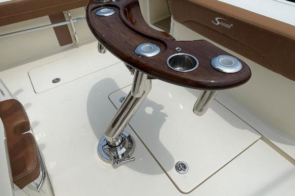 2020 Scout 420 LXF boat interior with polished rod holders and seating.